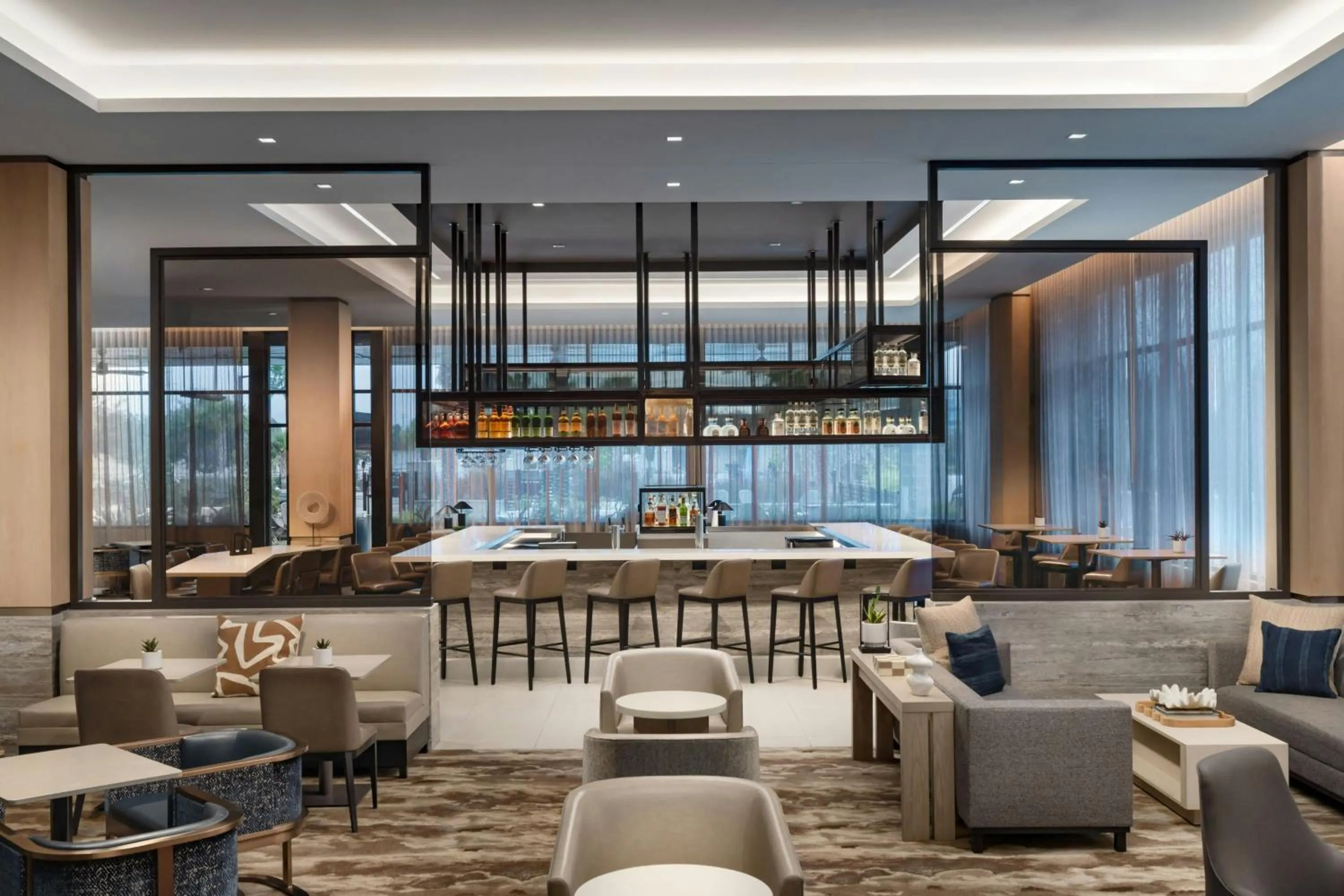 Lounge or bar in AC Hotel by Marriott Jacksonville St Johns Town Center