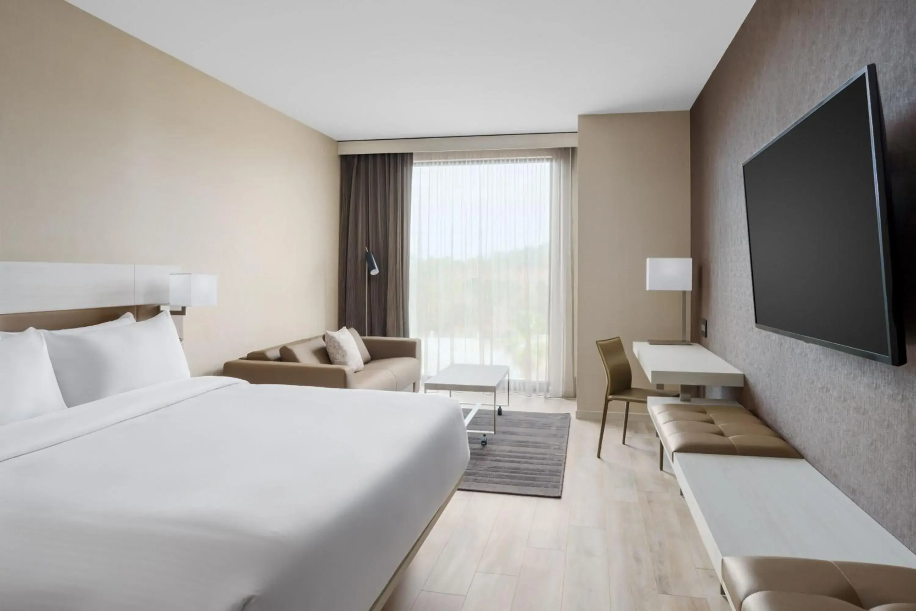 King Room with Sofa Bed - Hearing Accessible in AC Hotel by Marriott Jacksonville St Johns Town Center King Room with Sofa Bed - Hearing Accessible in AC Hotel by Marriott Jacksonville St Johns Town Center