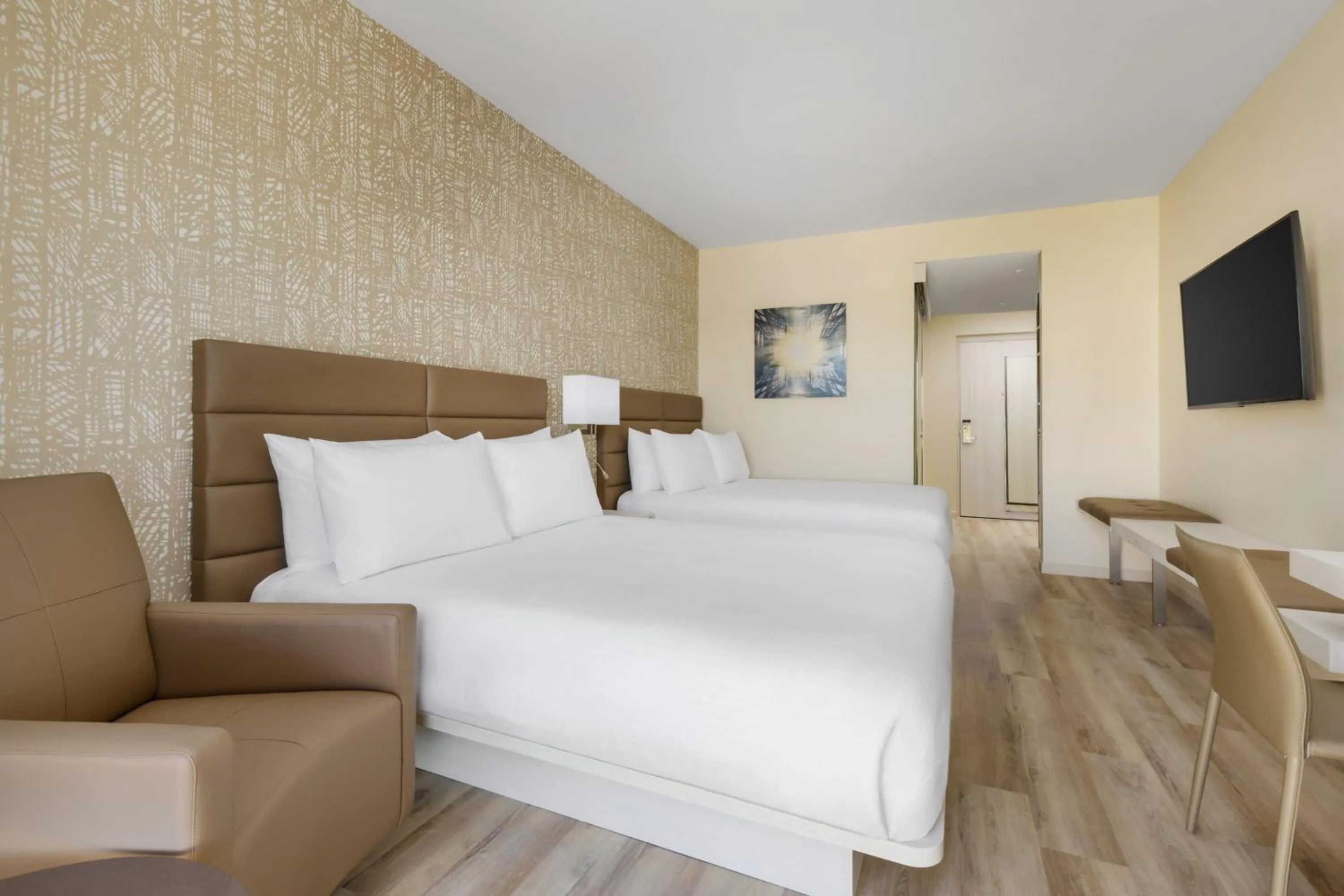 Photo of the whole room, Bed in AC Hotel by Marriott Naples 5th Avenue