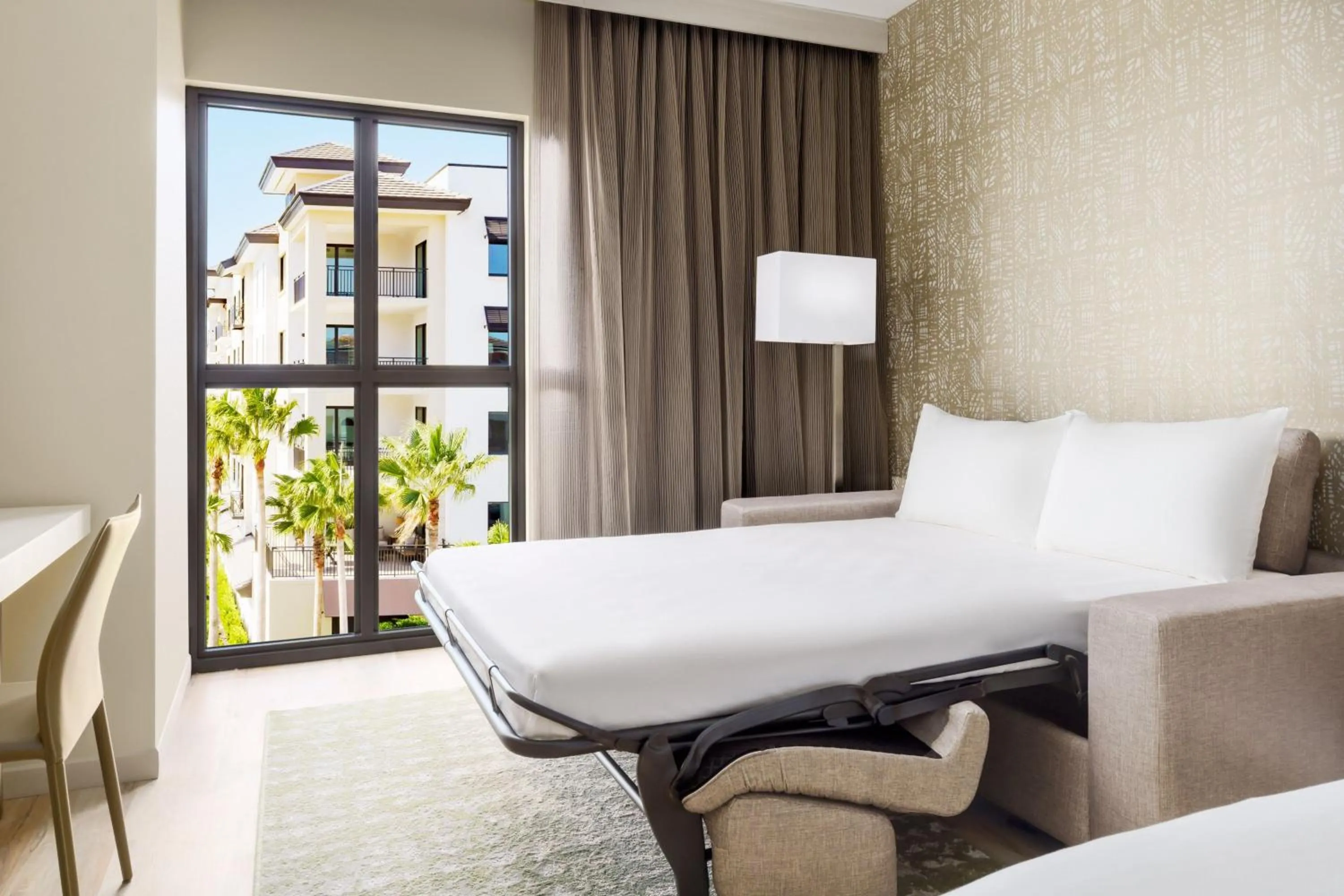 Photo of the whole room, Bed in AC Hotel by Marriott Naples 5th Avenue