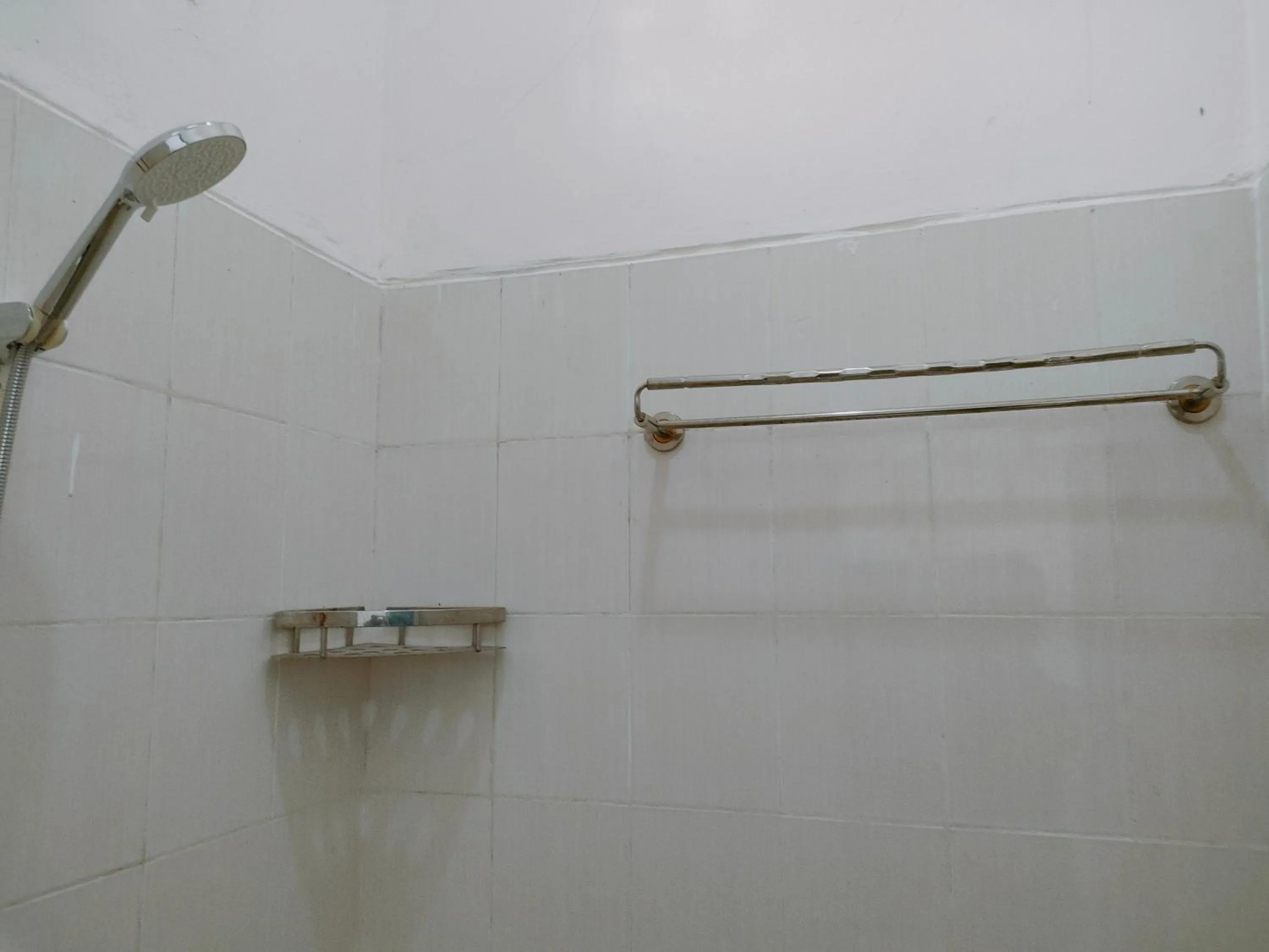 Bathroom in RedDoorz Syariah near Jogja Expo Center