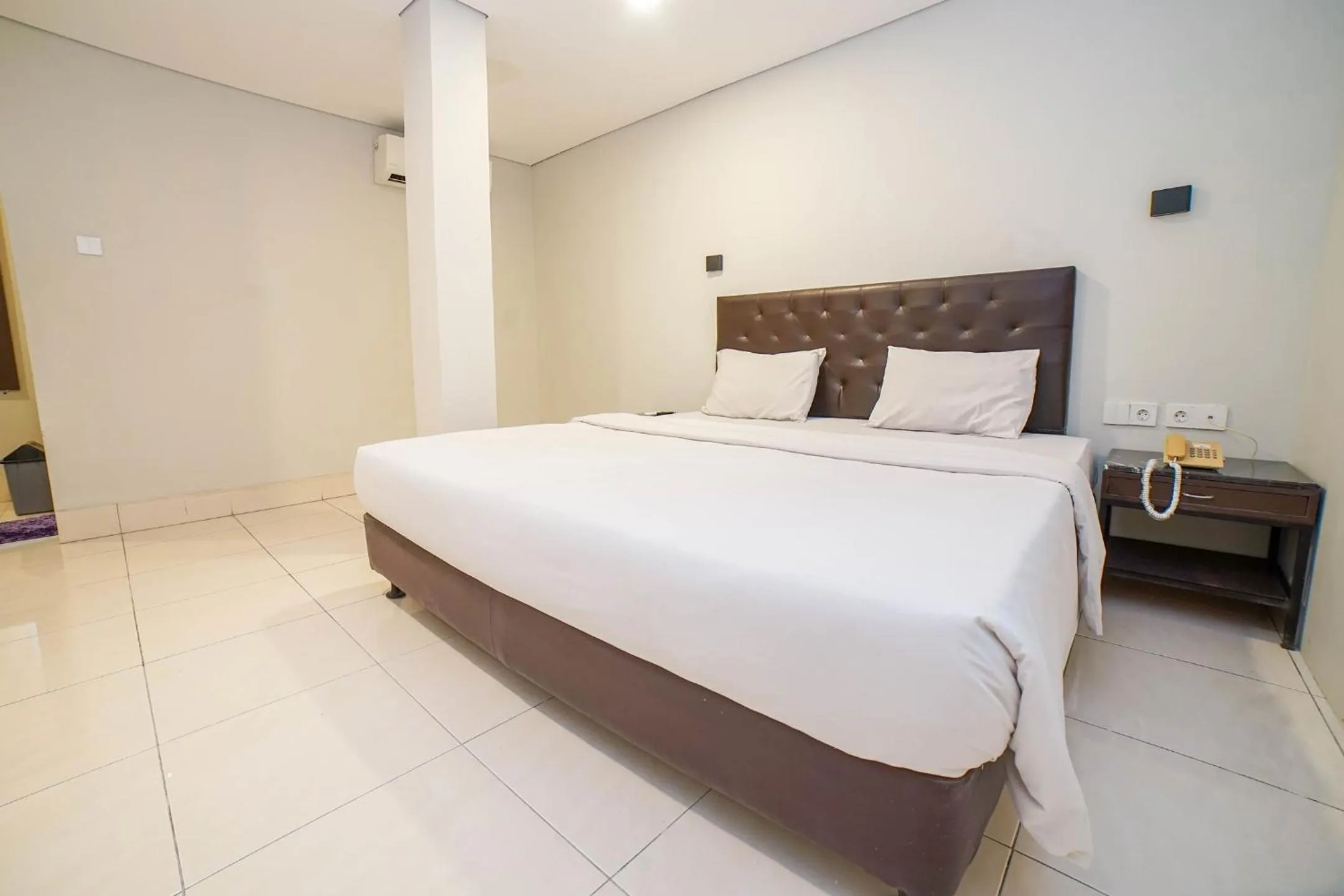 Bed in Hotel Kalisma by Alia