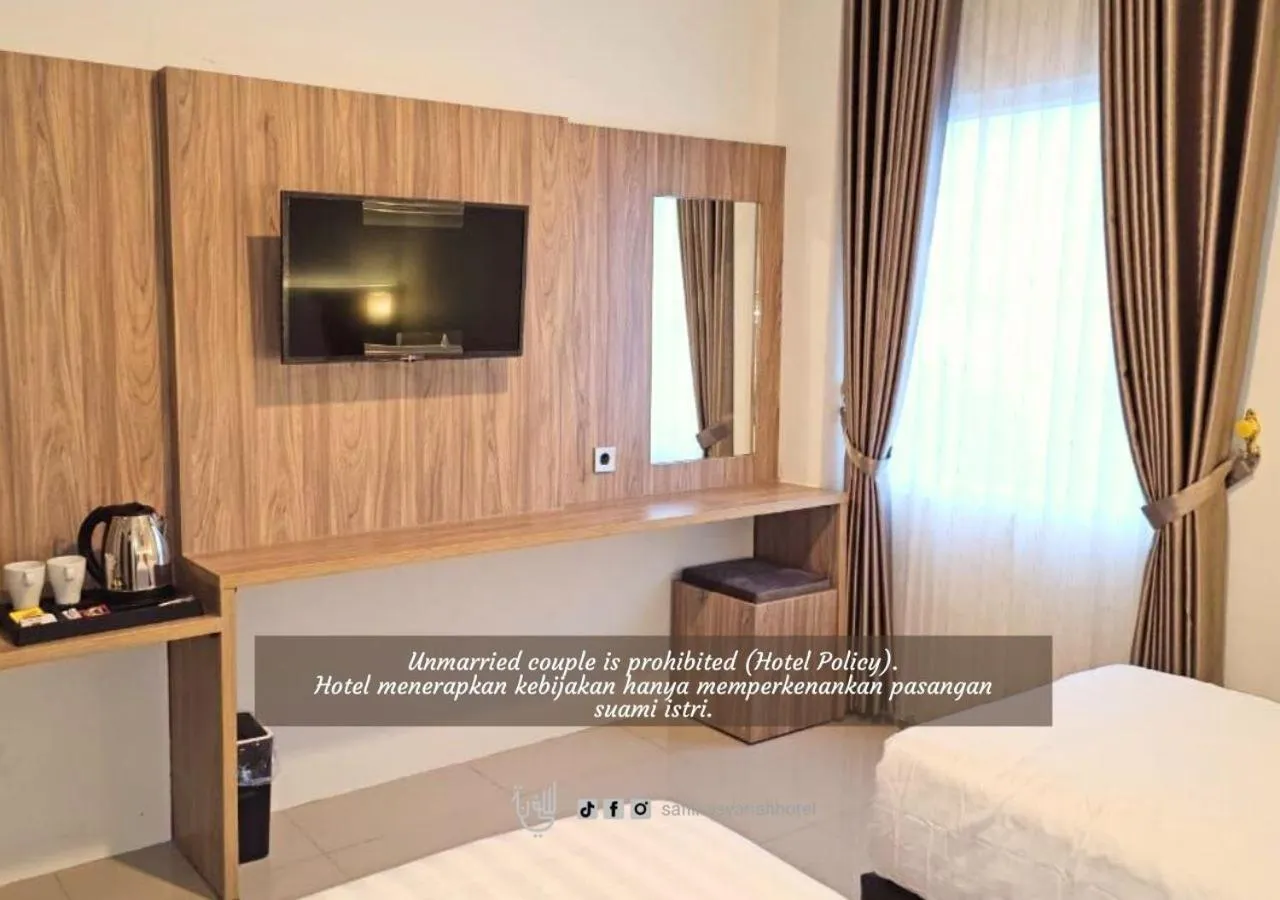 Bed in The Safiina Point Syariah Hotel