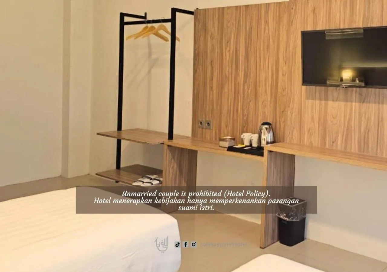 Bed in The Safiina Point Syariah Hotel