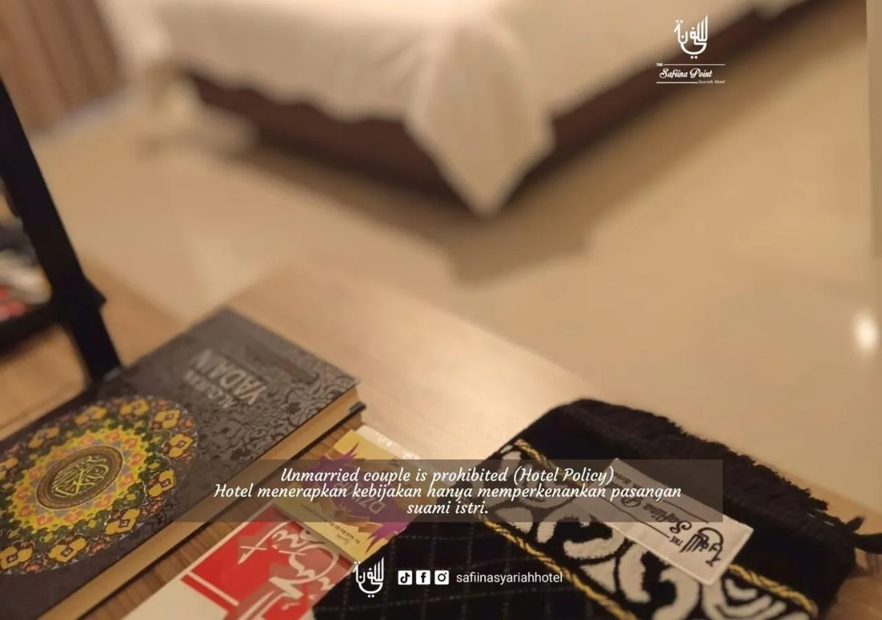 Bed in The Safiina Point Syariah Hotel