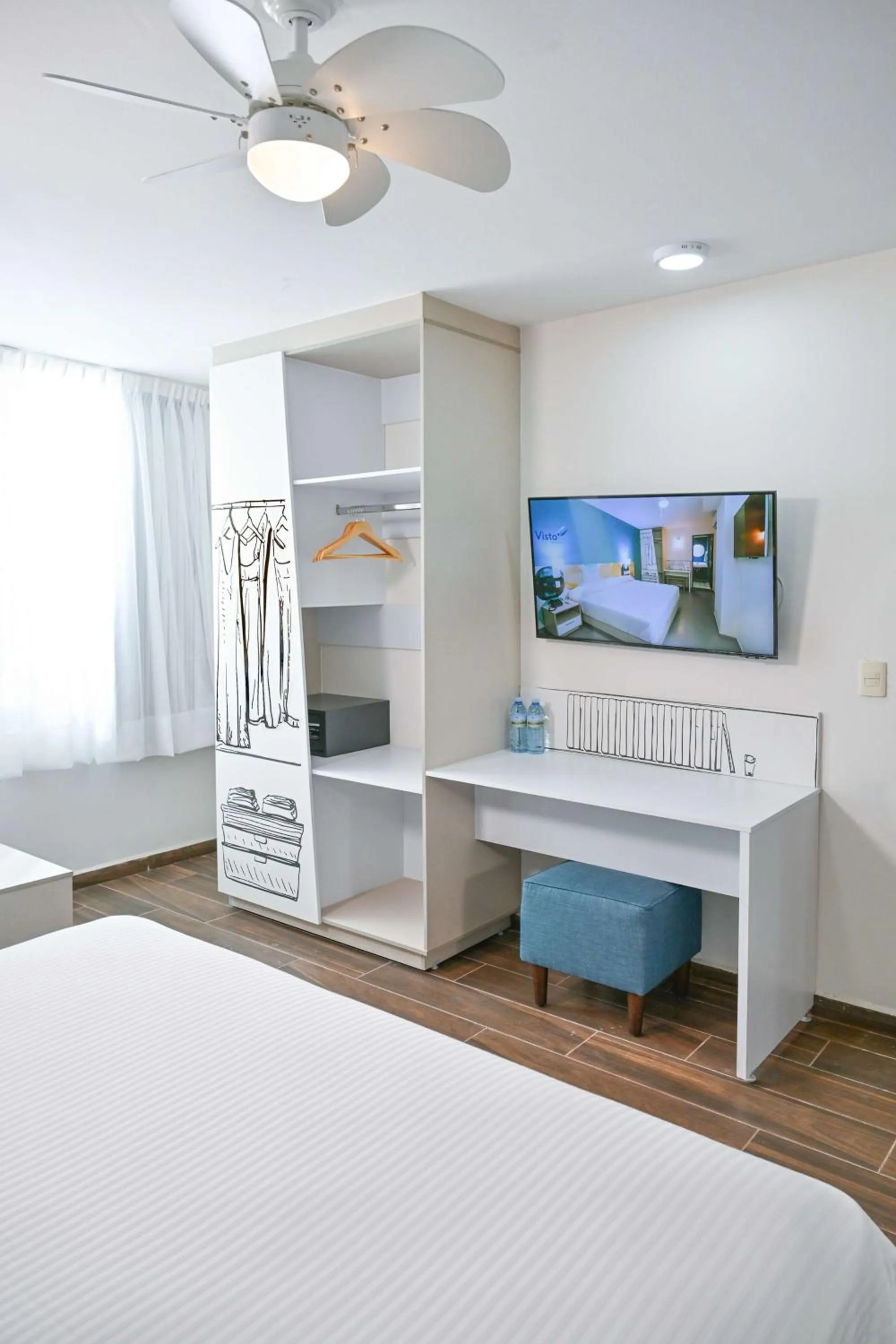 Bedroom, Bed in Vista Express Guadalajara Expo SureStay Collection by BW