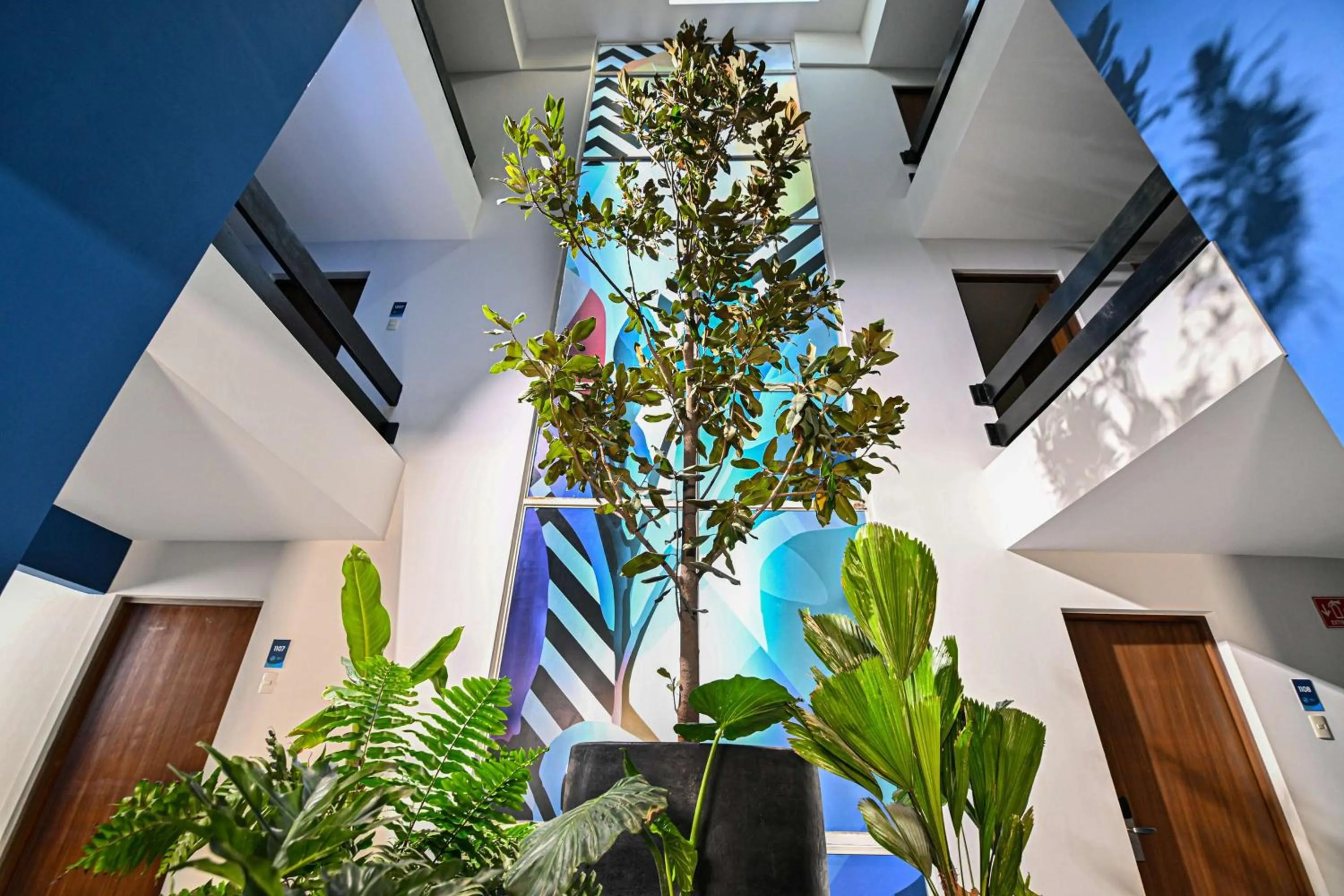 Lobby or reception in Vista Express Guadalajara Expo SureStay Collection by BW