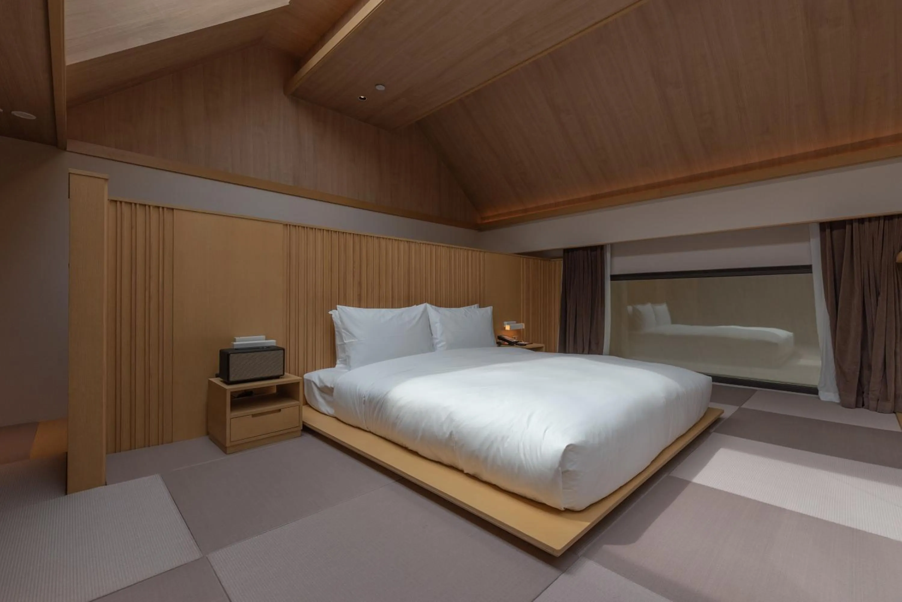 Bed in Hyakumangoku Onsen Hotel