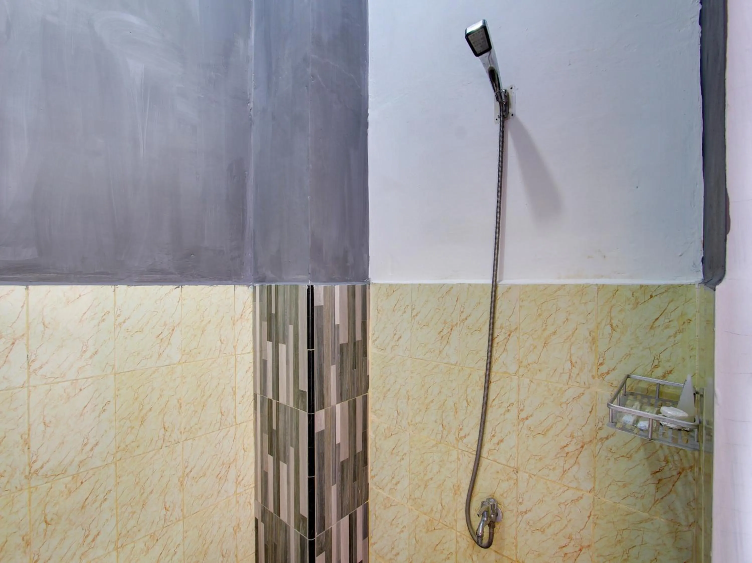 Bathroom in OYO 93188 Soren Hotel And Coffee