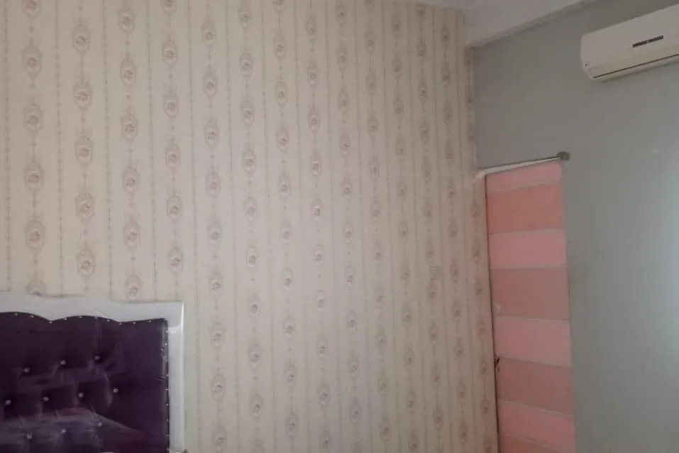 Bedroom in Hotel O Andesta Guest House SyariahNearAgrowisata Sungai Pinang Agro Nadin