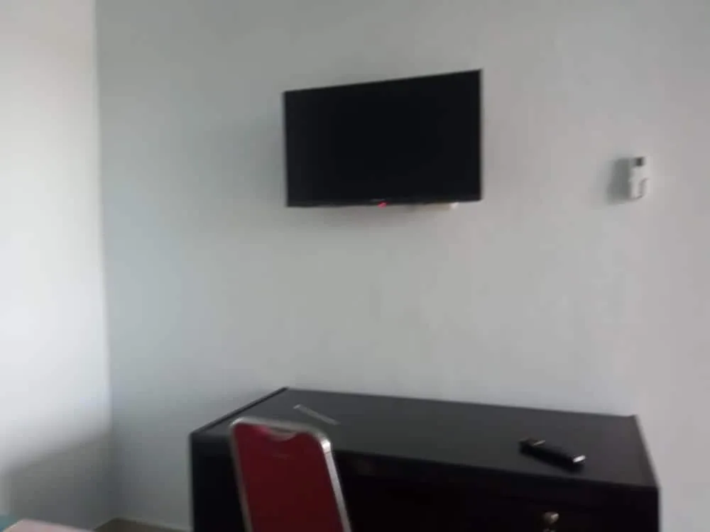 Bedroom in Hotel O Andesta Guest House SyariahNearAgrowisata Sungai Pinang Agro Nadin