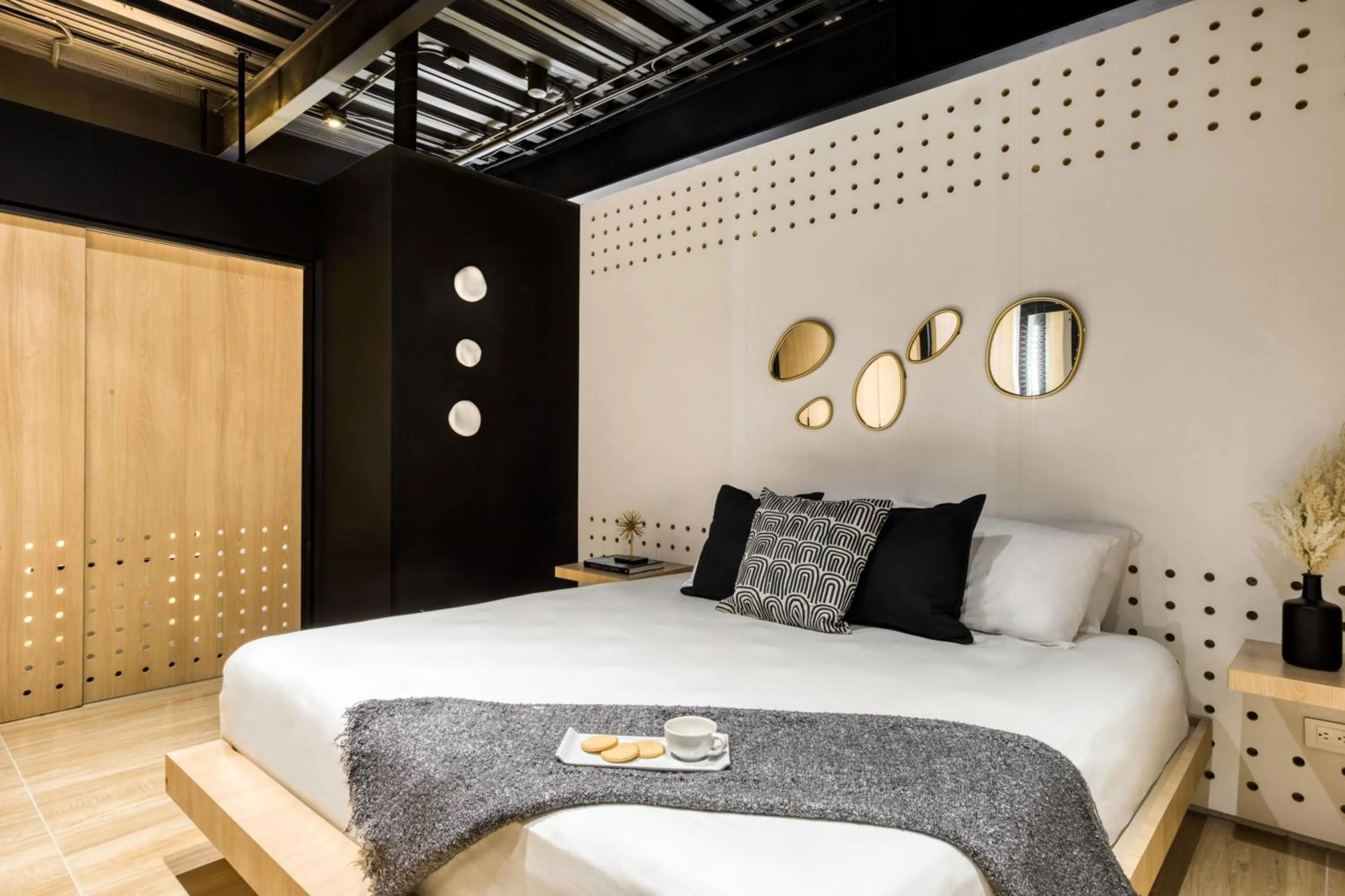 Bed in Downtown Designer Apartments by ULIV