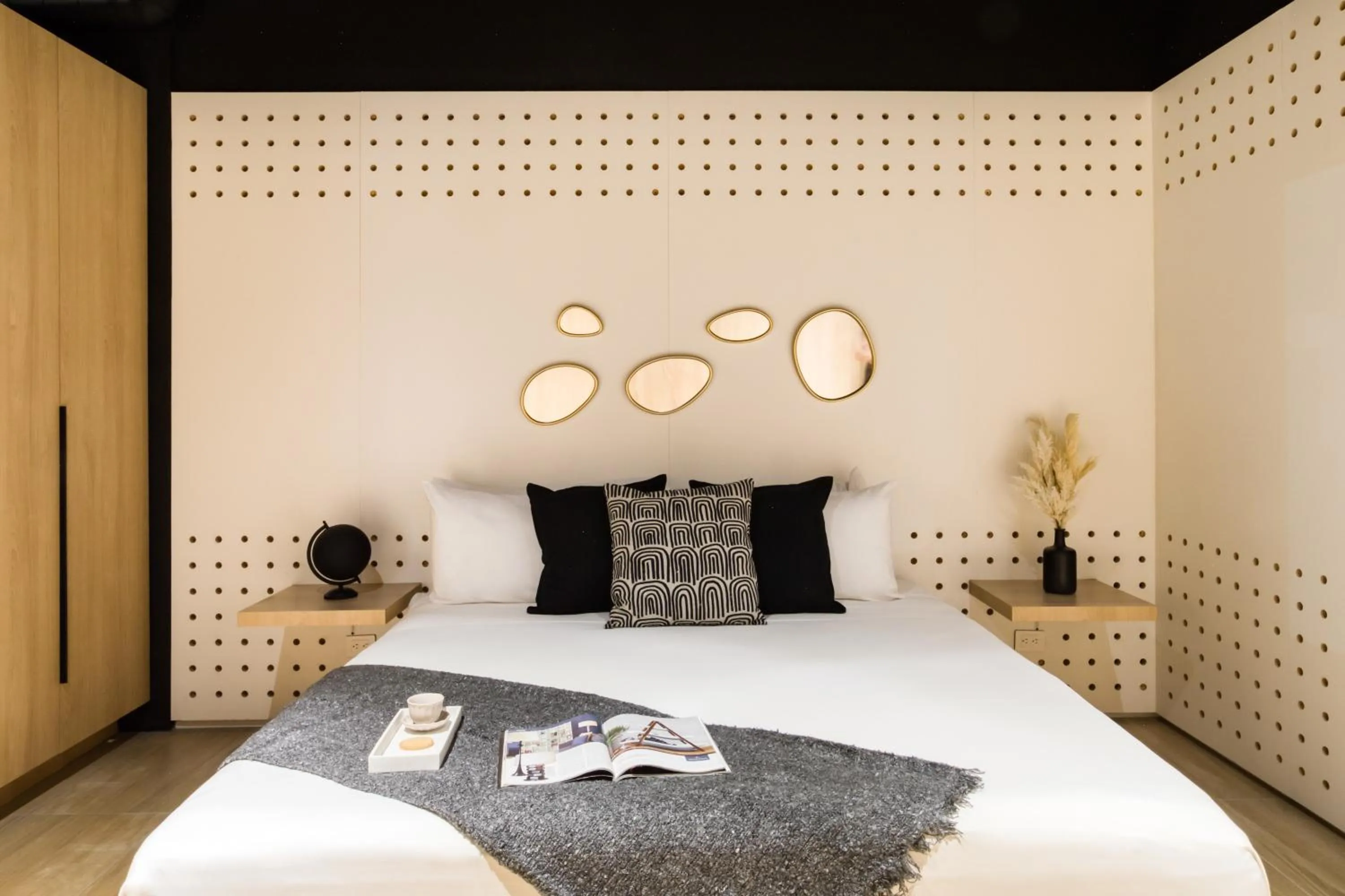 Bed in Downtown Designer Apartments by ULIV