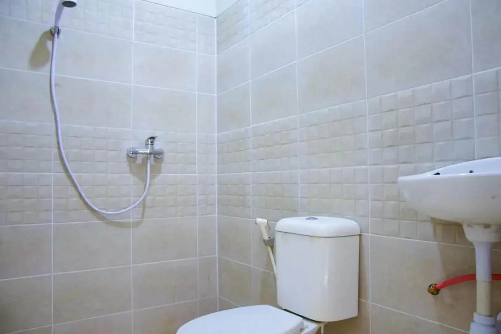 Bathroom in RedDoorz near Mangga Dua Square