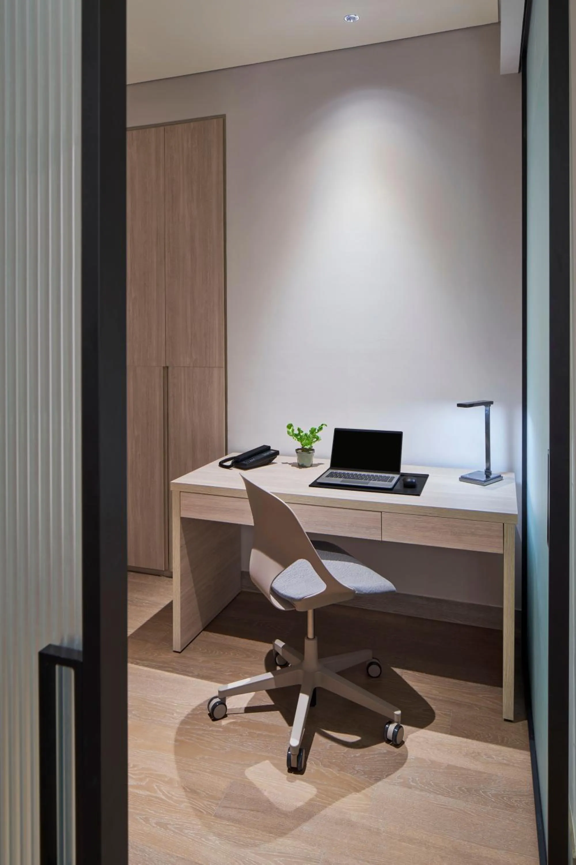 Seating area in PARKROYAL Serviced Suites Jakarta