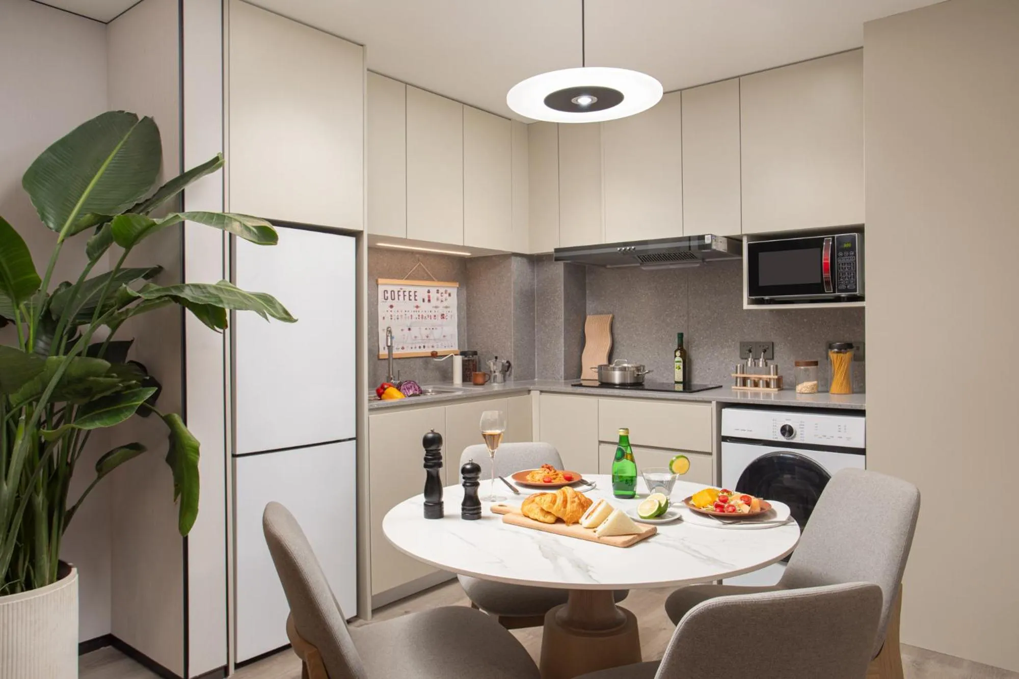 Kitchen or kitchenette in Citadines Hope City Boao