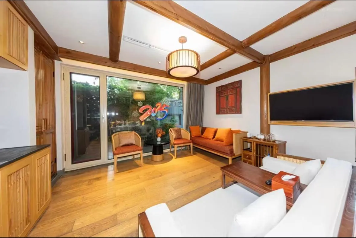 Living room, Bed in The JOY courtyard Beijing near Tiananmen Forbidden City