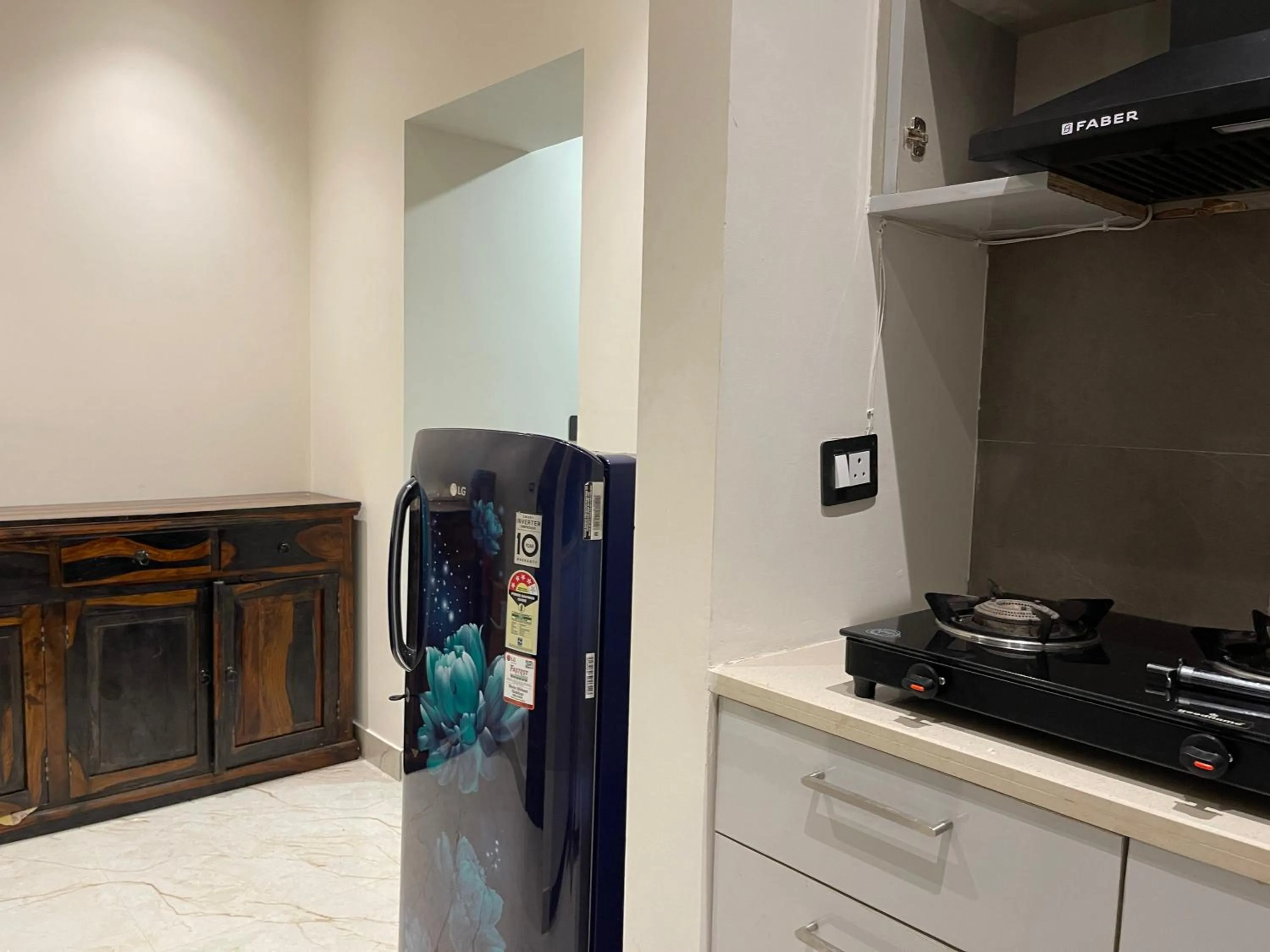 Kitchen or kitchenette in Bedchambers Stay near Select Citywalk, Saket