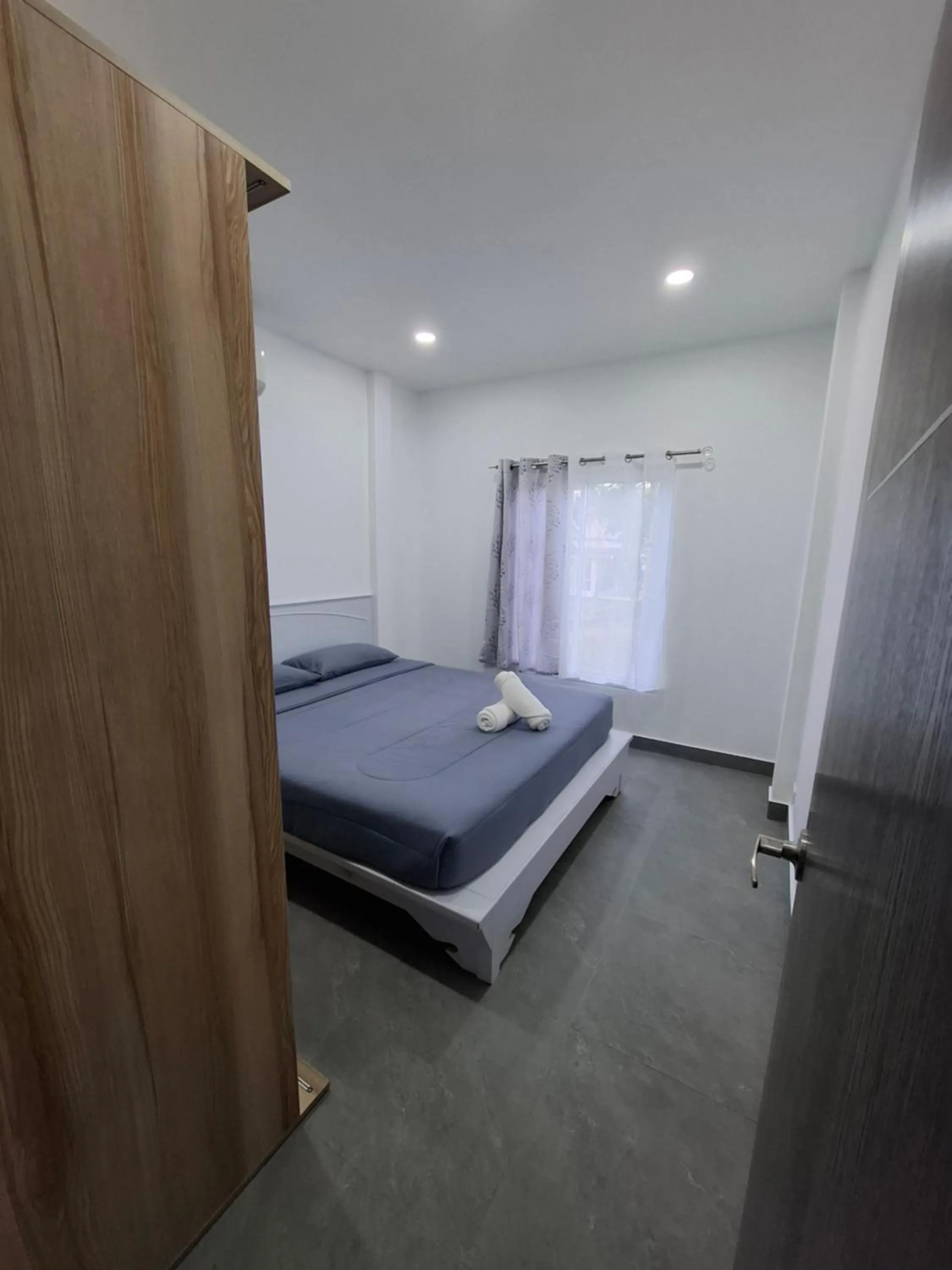 Photo of the whole room, Bed in Thiptara Resort - adults only