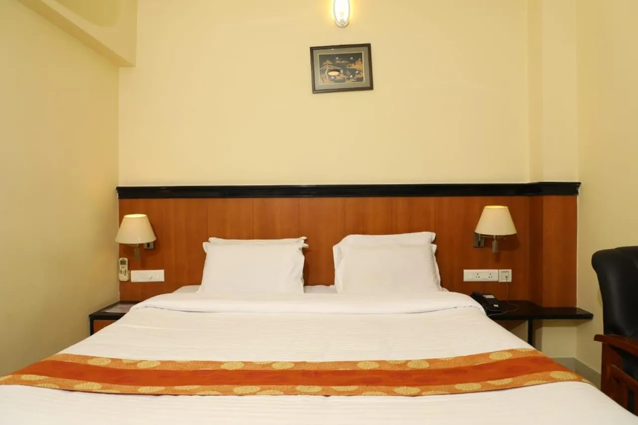 Bed in Hotel Shrie Shaanth