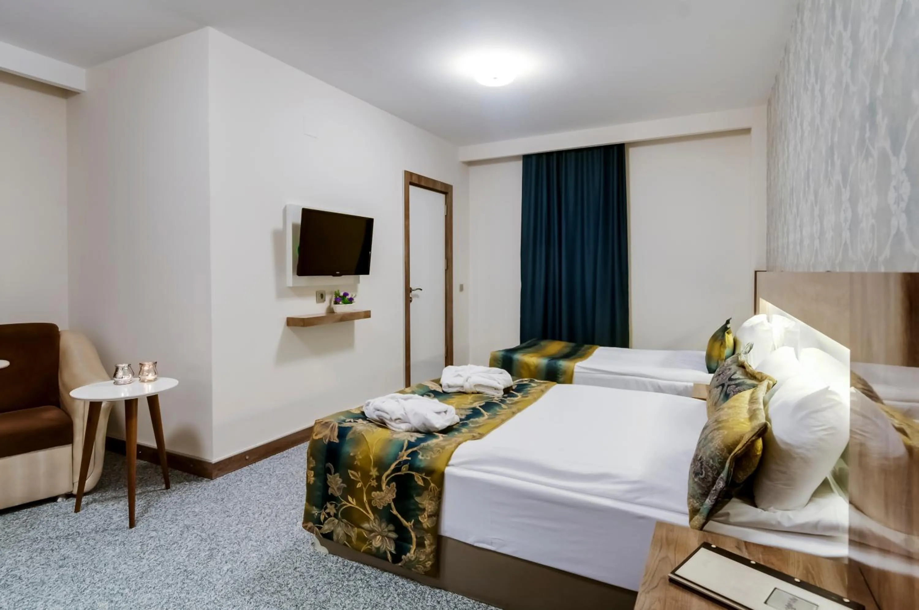 Bed in PARK YALÇIN HOTEL