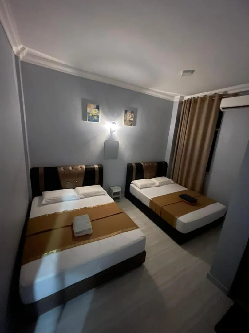 Photo of the whole room, Bed in Perhentian Suria