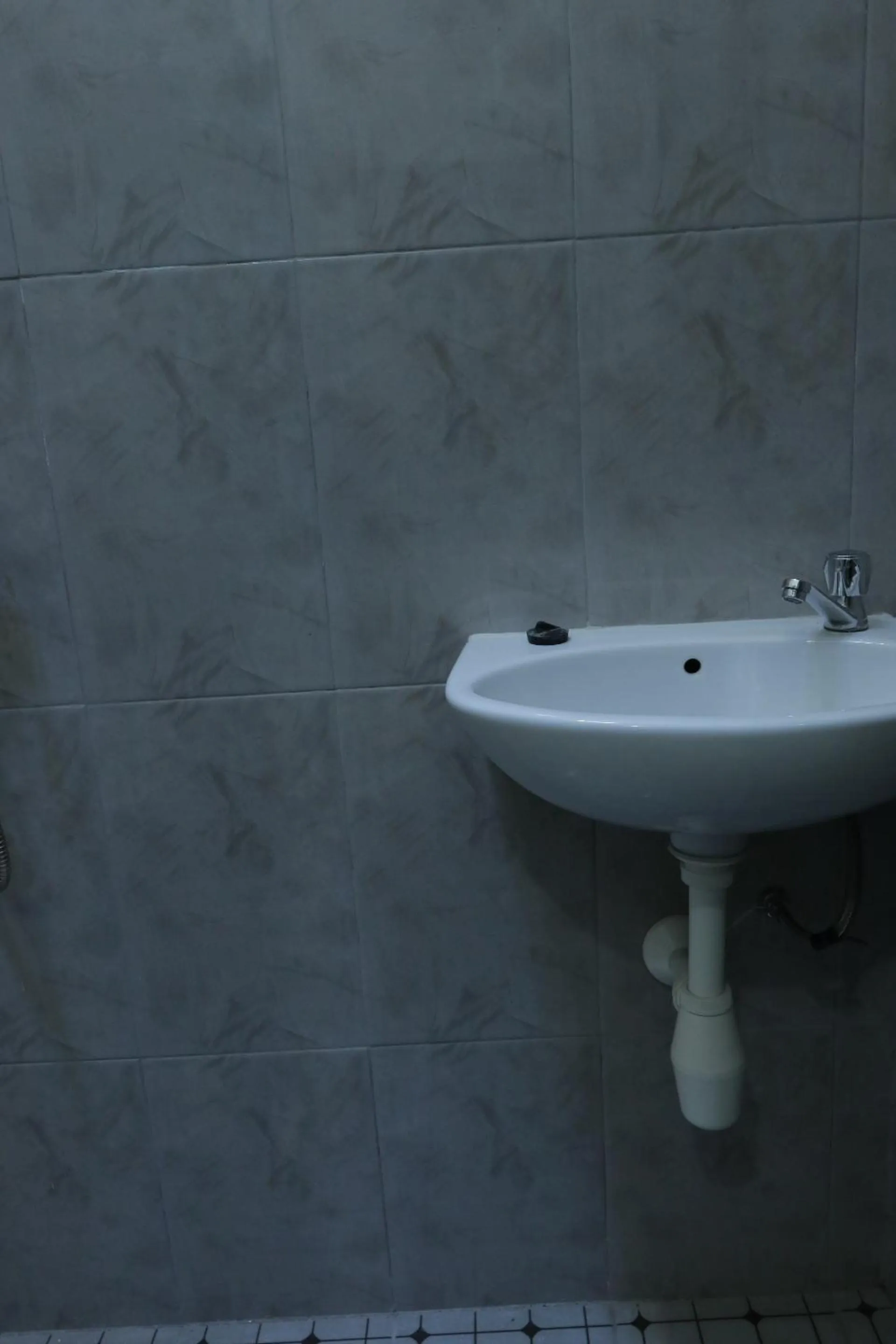 Bathroom in SPOT ON 93189 Rumah Berkah Syariah