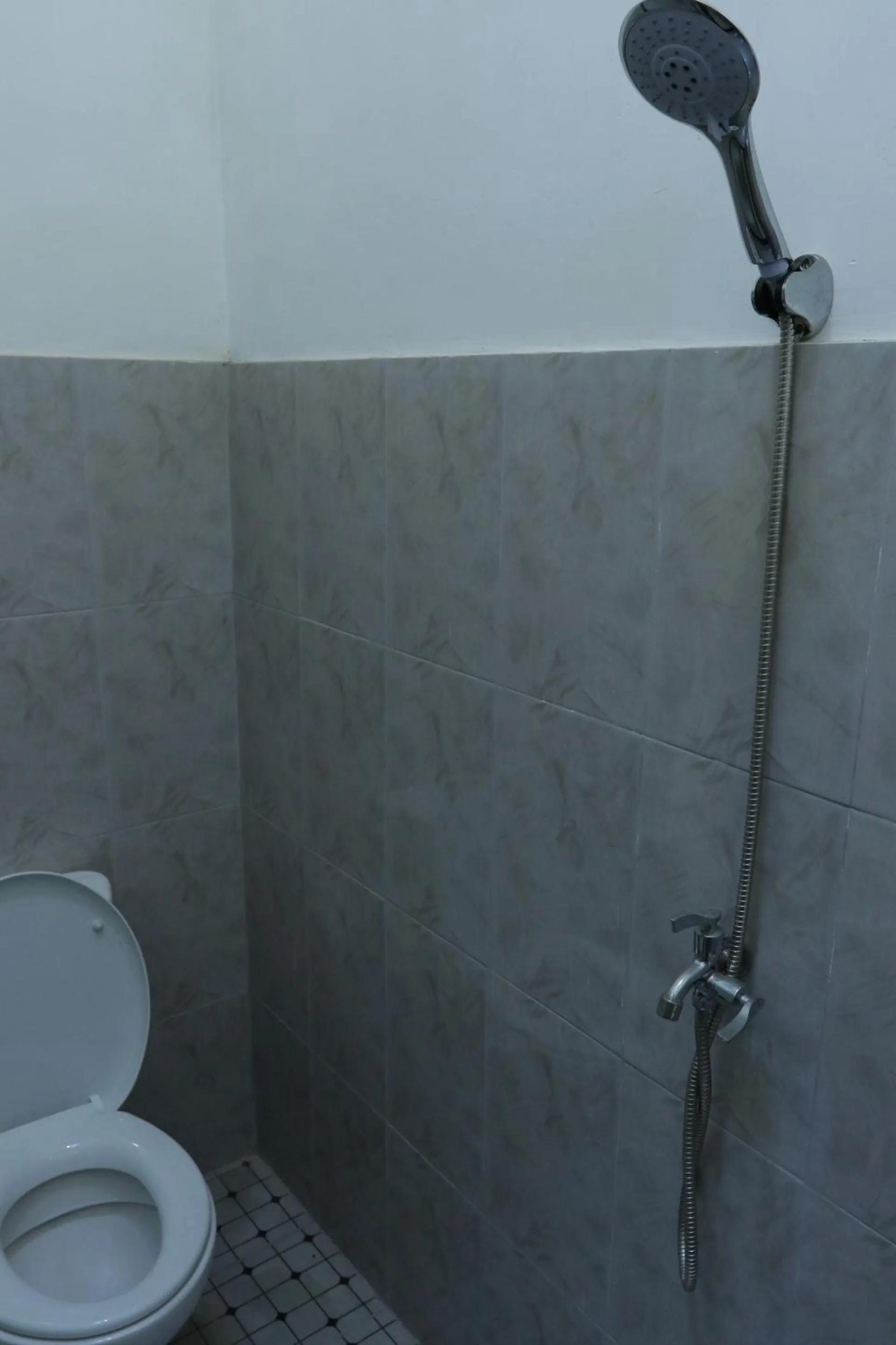 Bathroom in SPOT ON 93189 Rumah Berkah Syariah