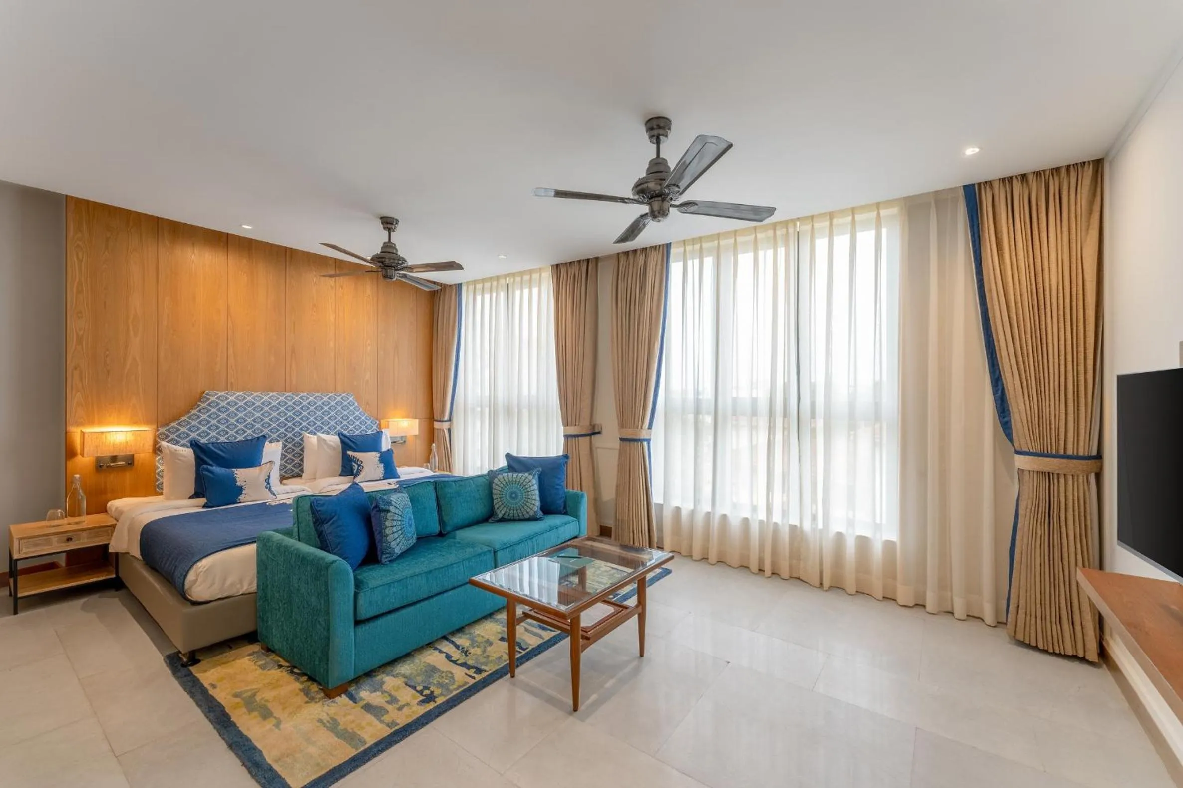 Bedroom in The Astor - All Suites Hotel Candolim Goa