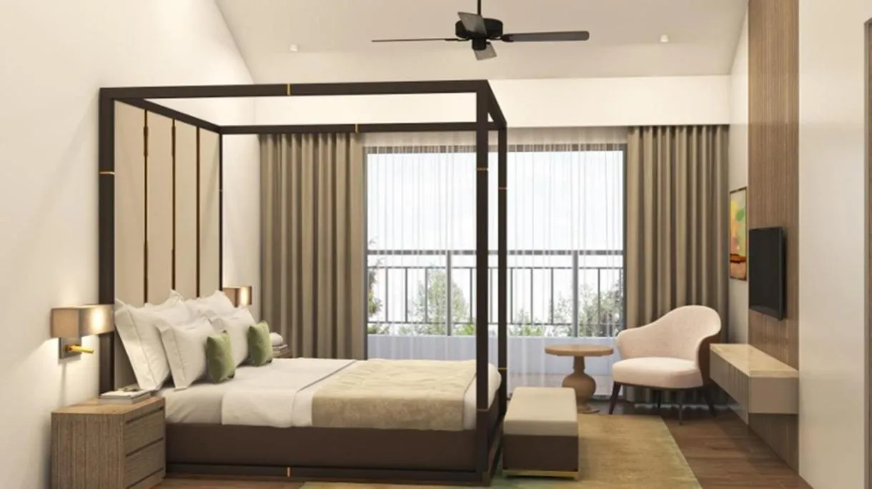 Bed in The Astor - All Suites Hotel Candolim Goa