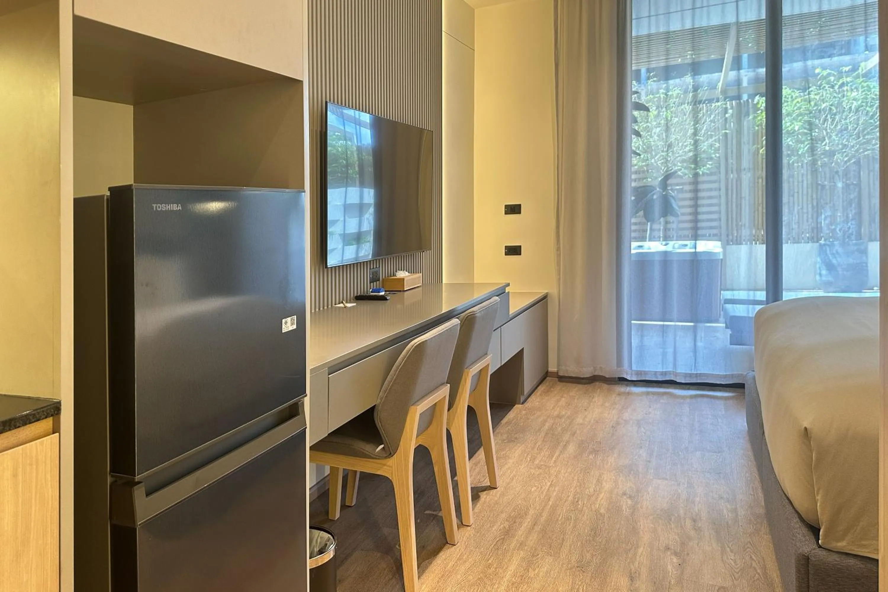 Bed in La Green Hotel and Residence