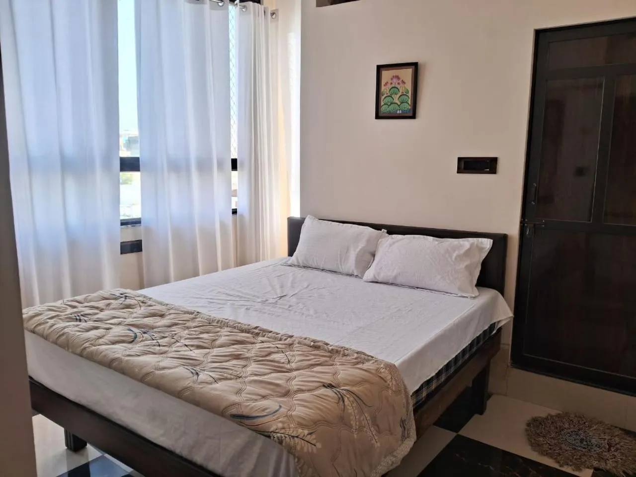 Photo of the whole room, Bed in Jajora Hotel by Premier Hotels