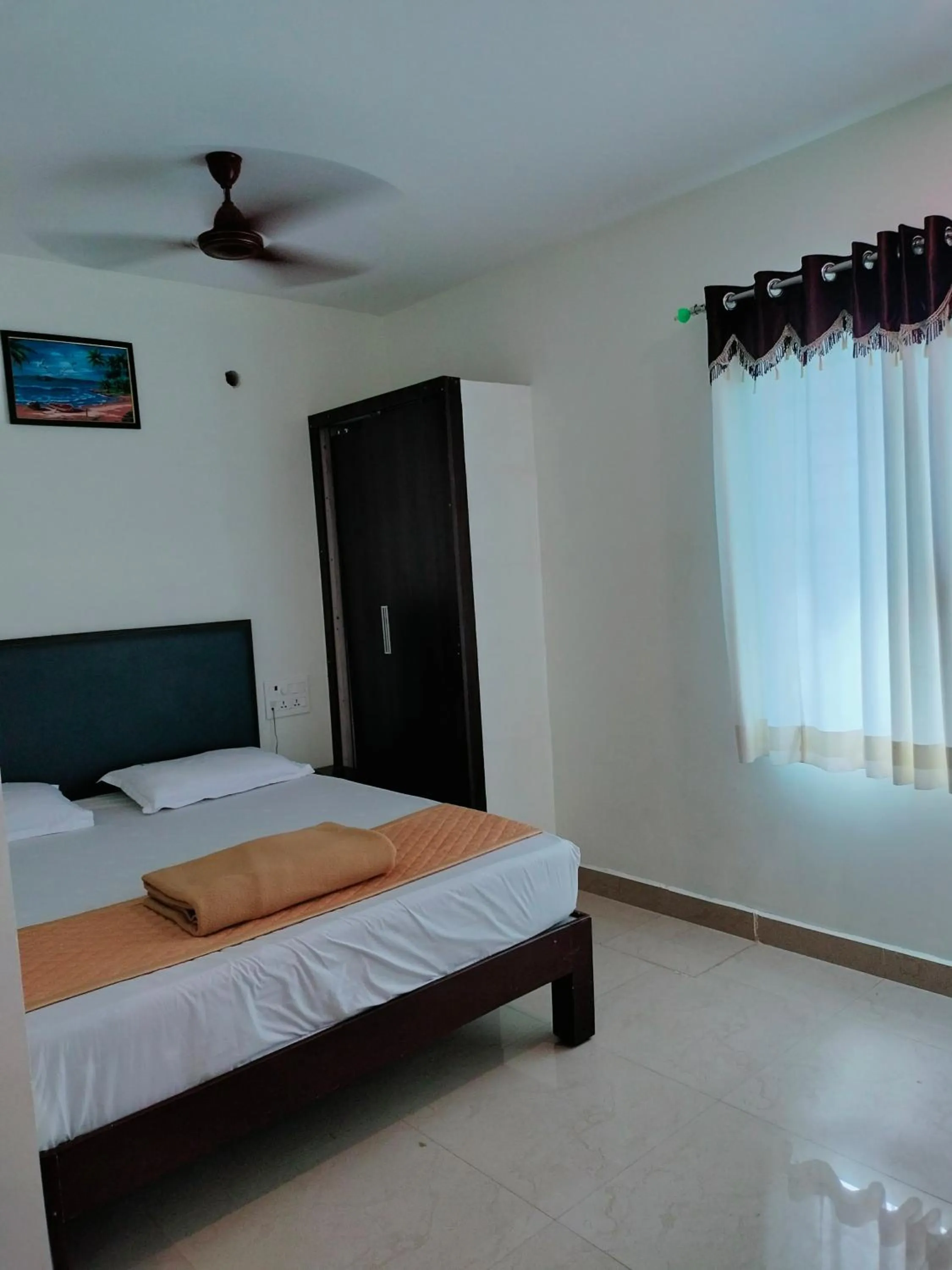 Bed in Hotel Sitar Grand