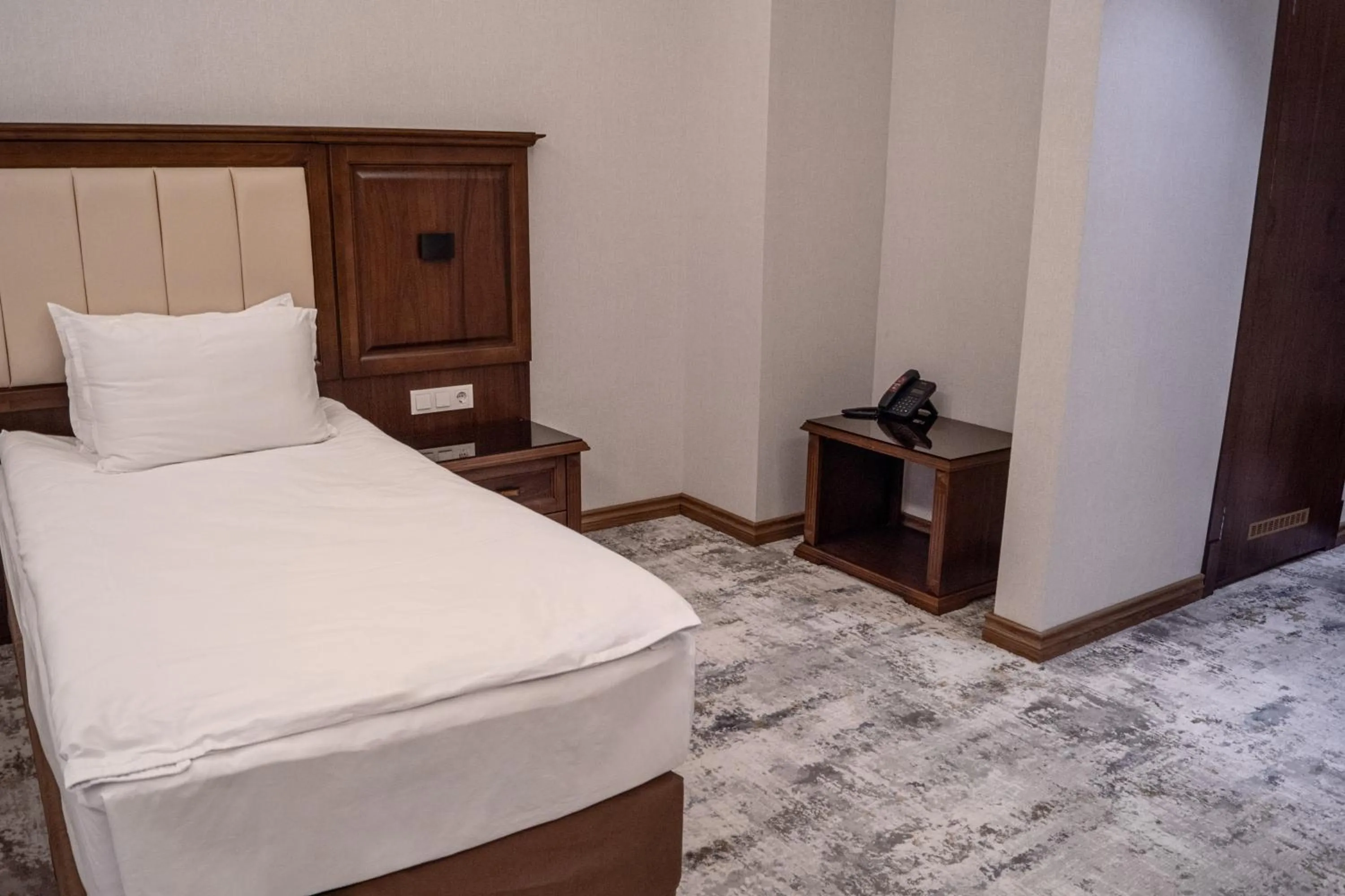 Bed in Grand Plaza Hotel Samarkand