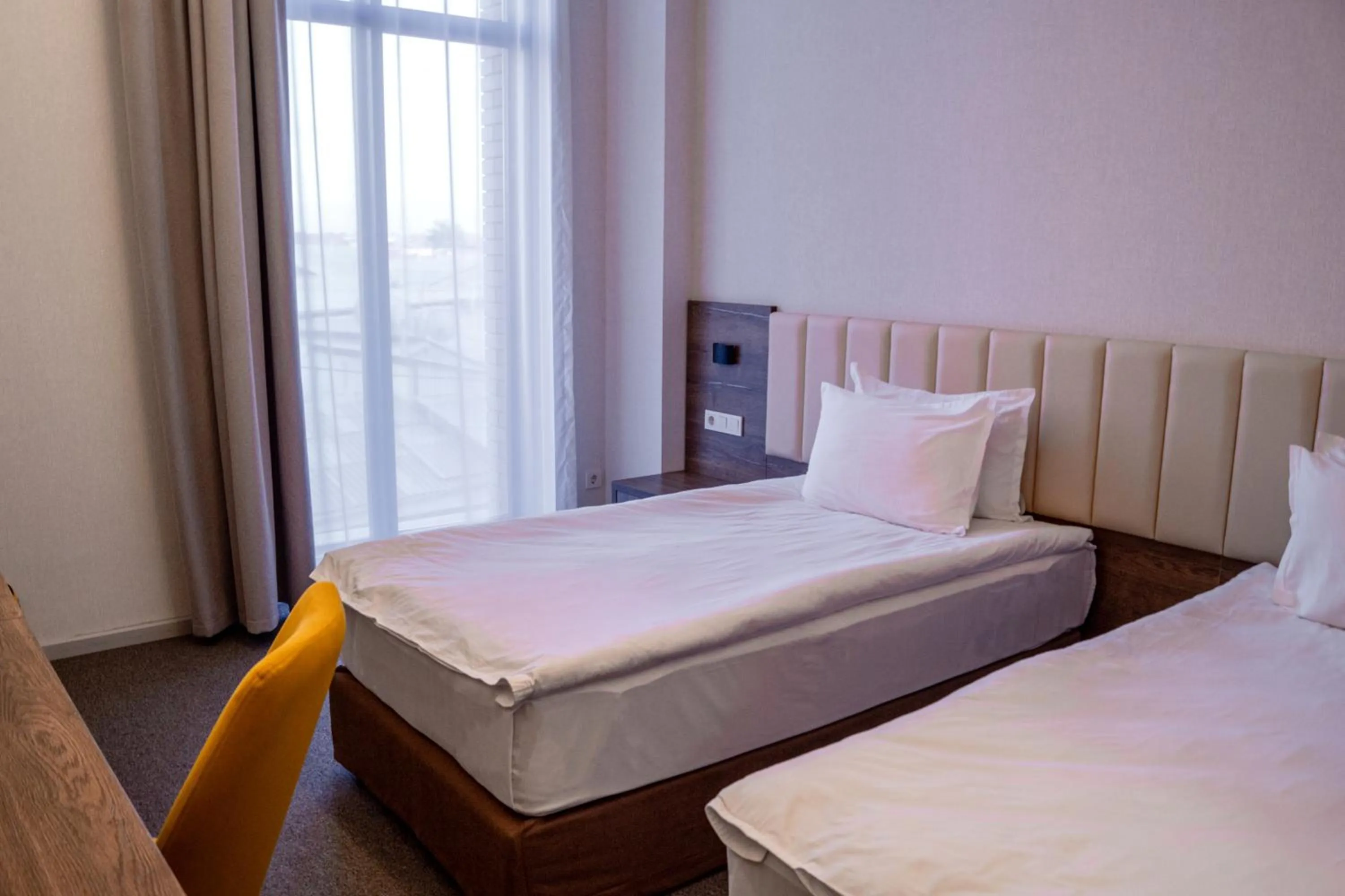 Bed in Grand Plaza Hotel Samarkand