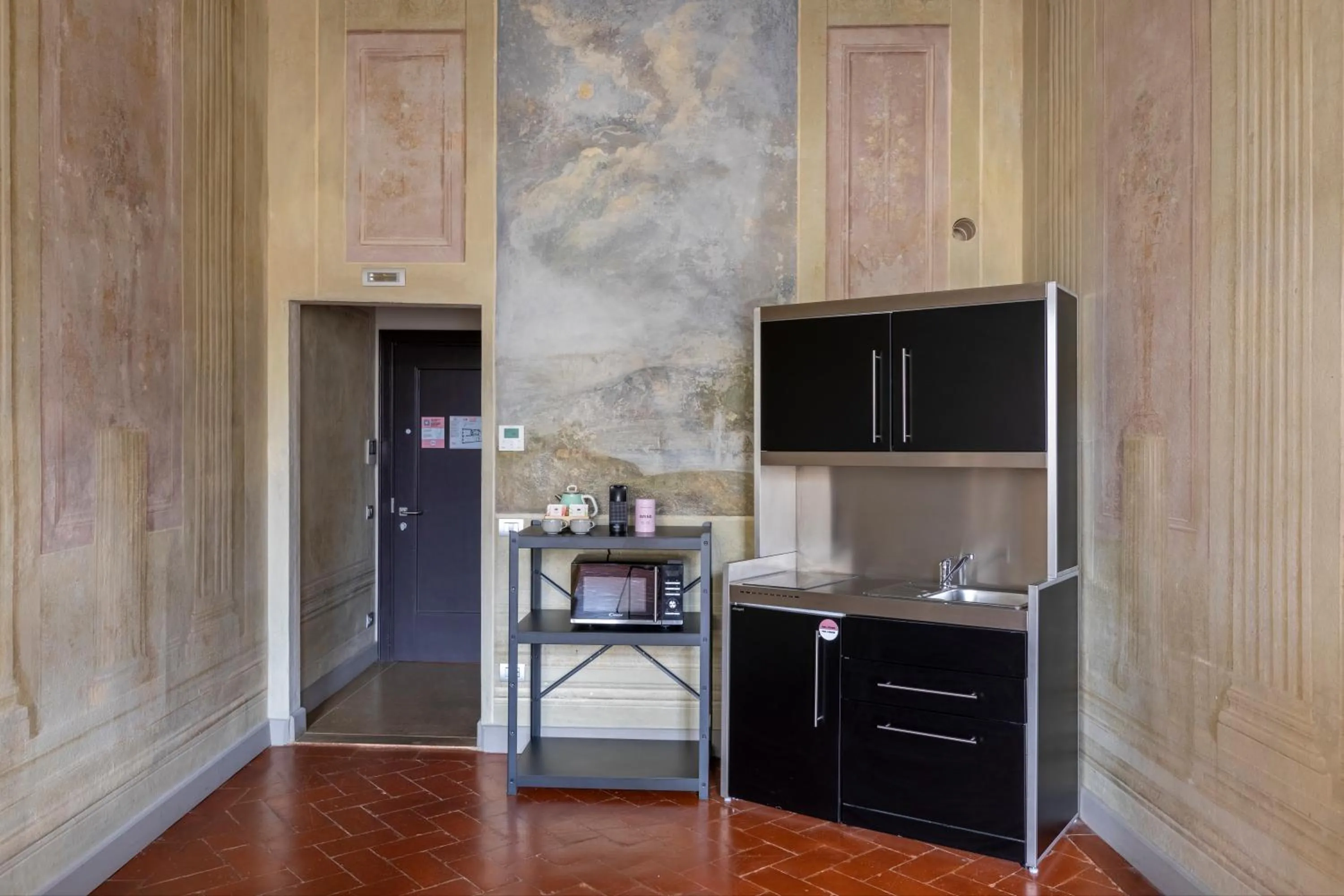 Kitchen or kitchenette in Numa Florence Felice
