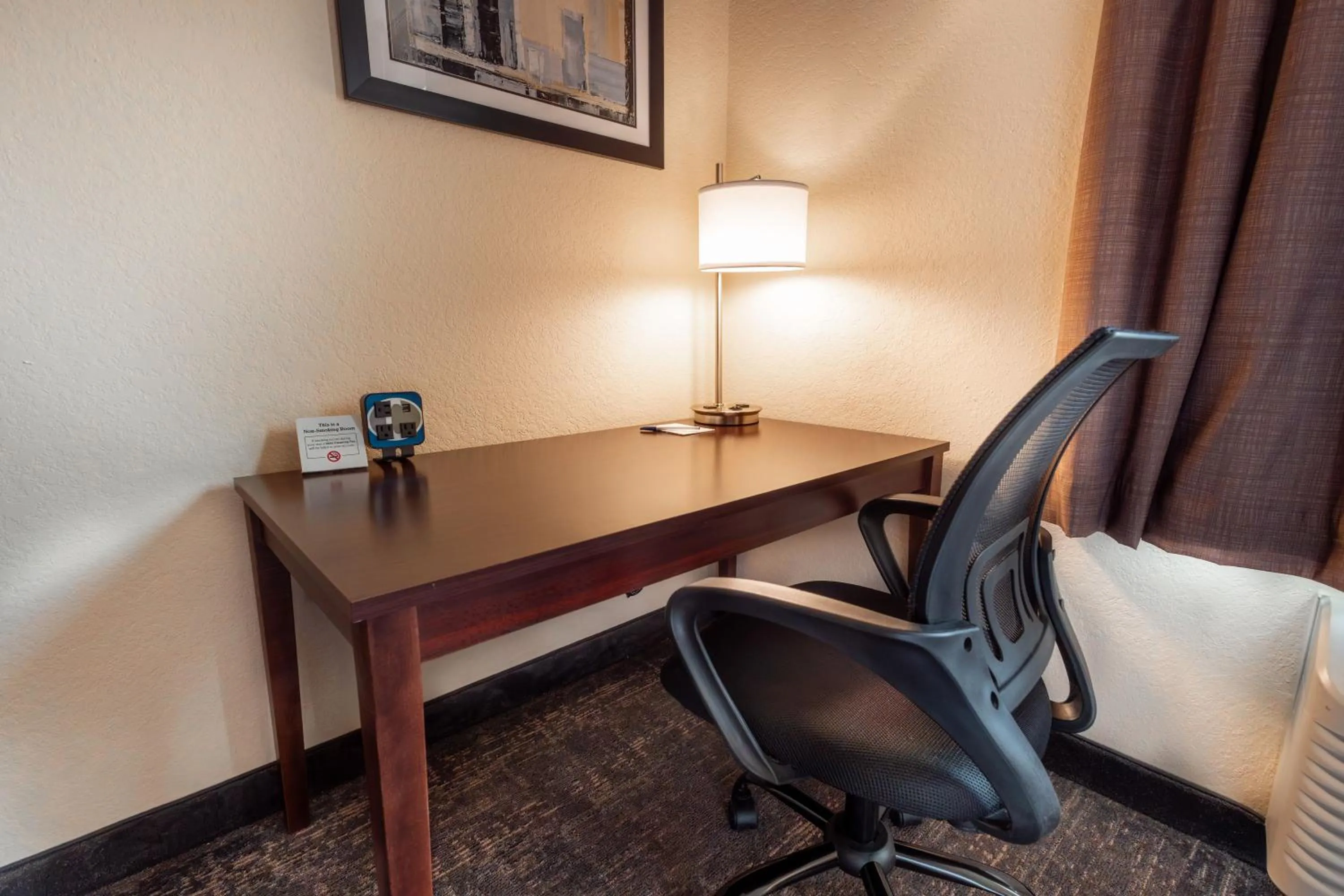 Bedroom in Cobblestone Inn & Suites - Big Lake