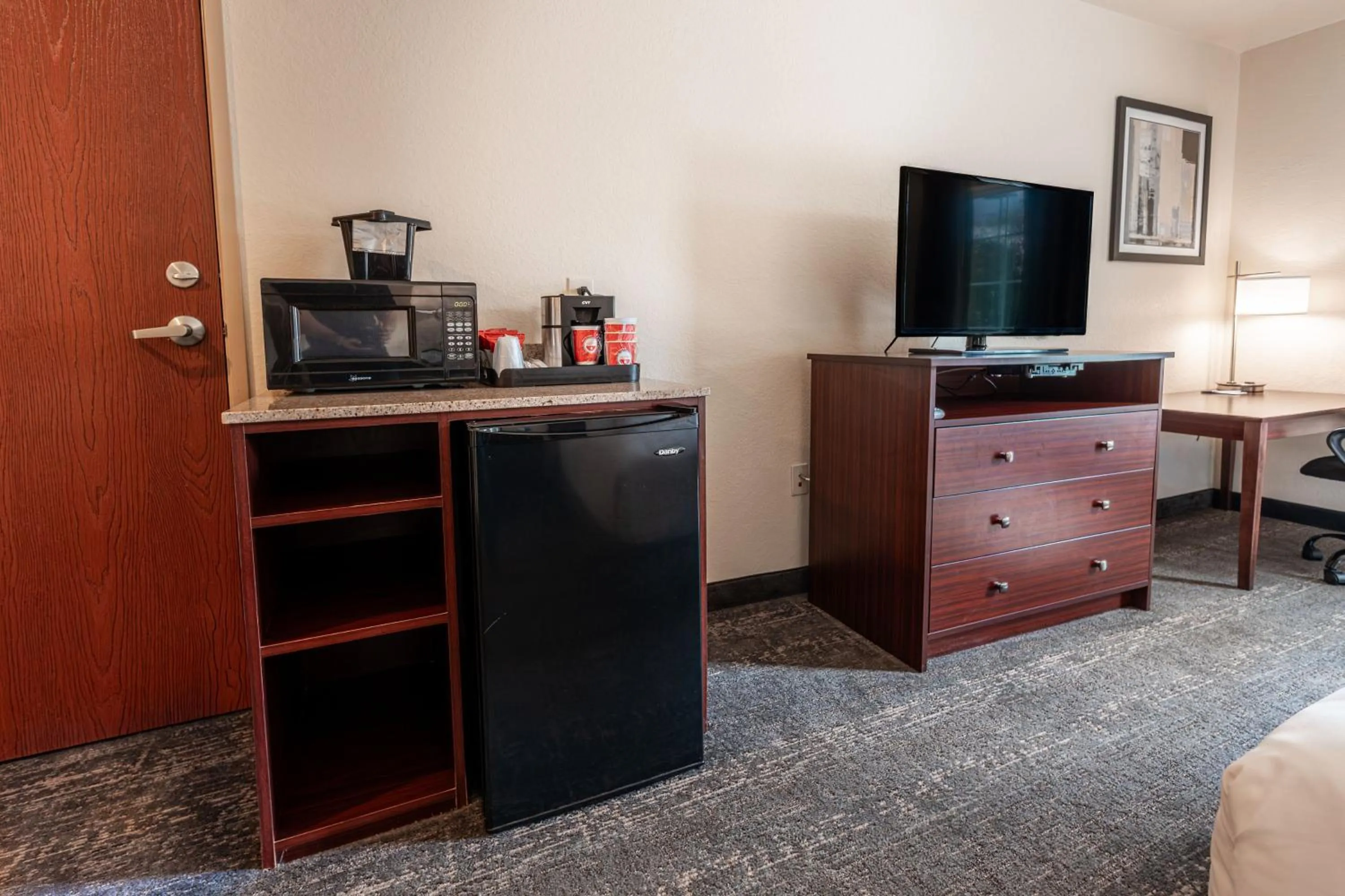 Bedroom in Cobblestone Inn & Suites - Big Lake