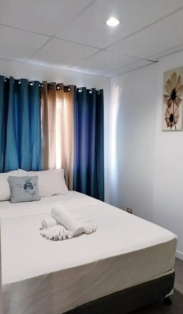 Bedroom in Smart Condominium Official