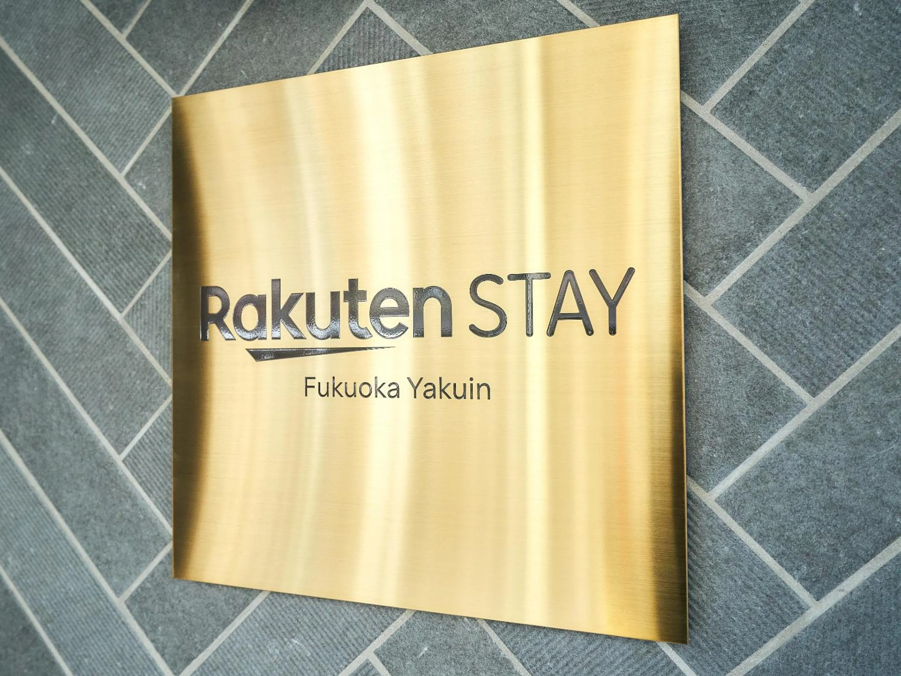Property logo or sign in Rakuten STAY Fukuoka Yakuin