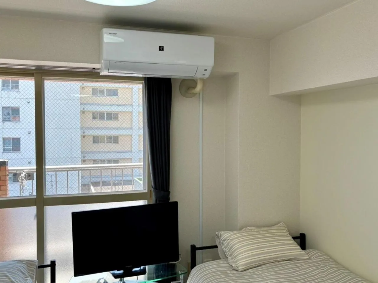 air conditioner, Bed in KIYAZA Space Sapporo 2