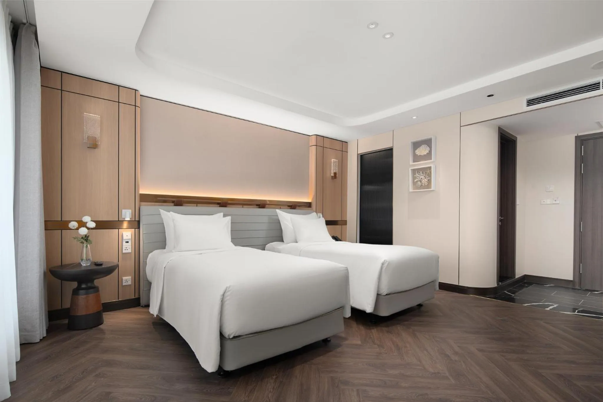 Bed in Grand Pioneers Halong Bay Cruise 1