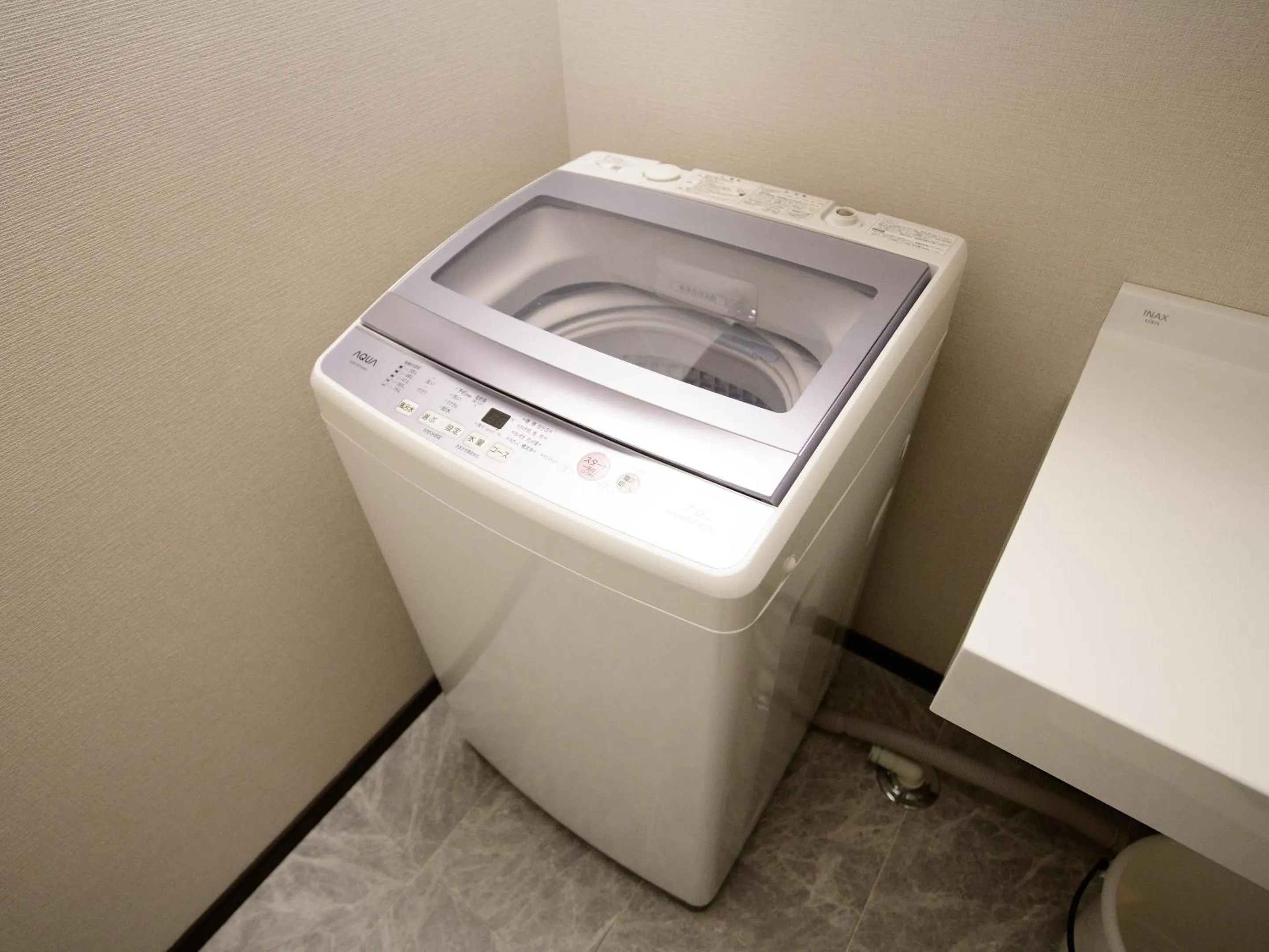 washing machine in Rakuten STAY HOUSE x WILL STYLE Sasebo