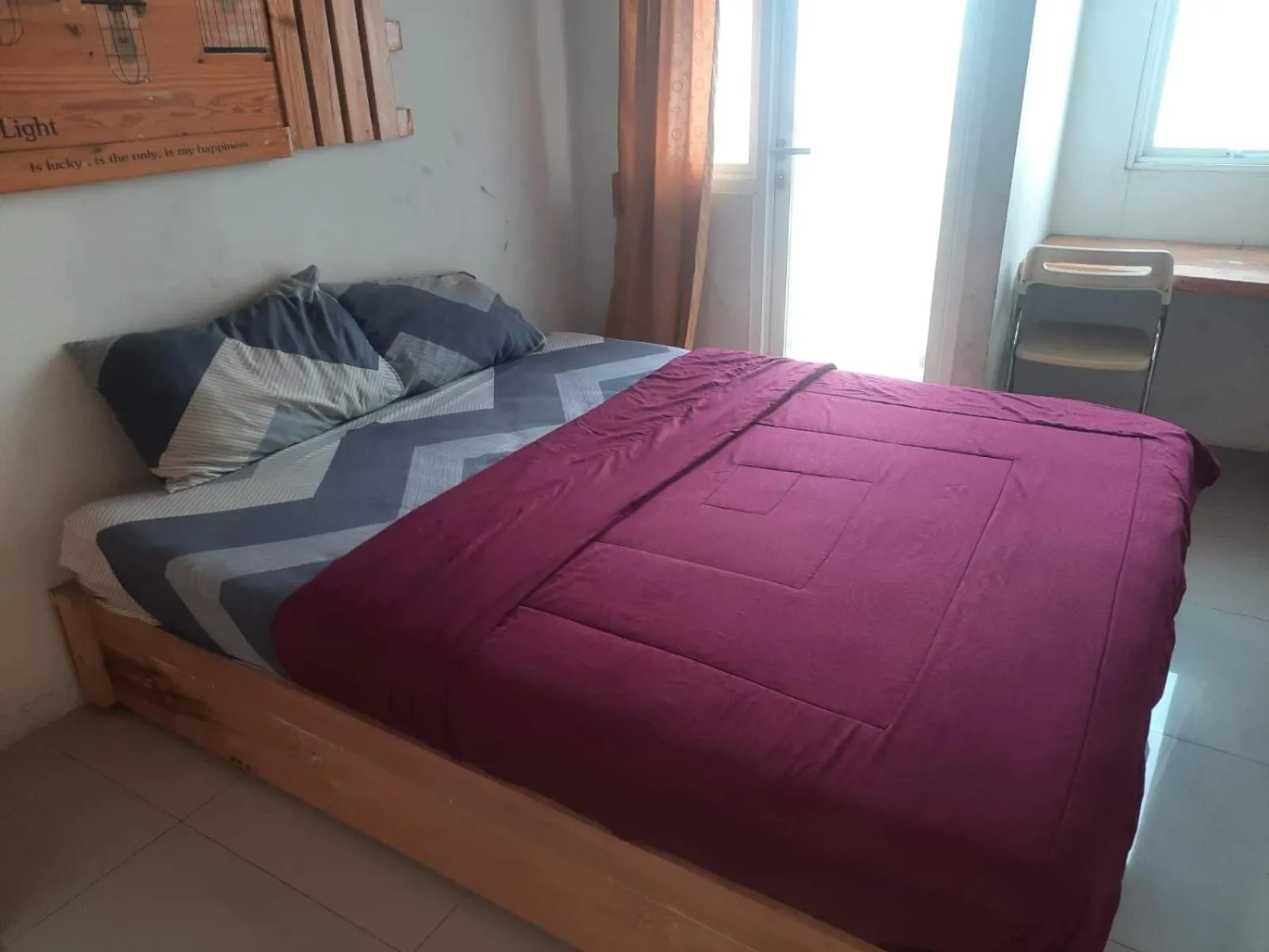 Bedroom, Bed in OYO Life 93140 Apartment Grand Sentraland By Fahri