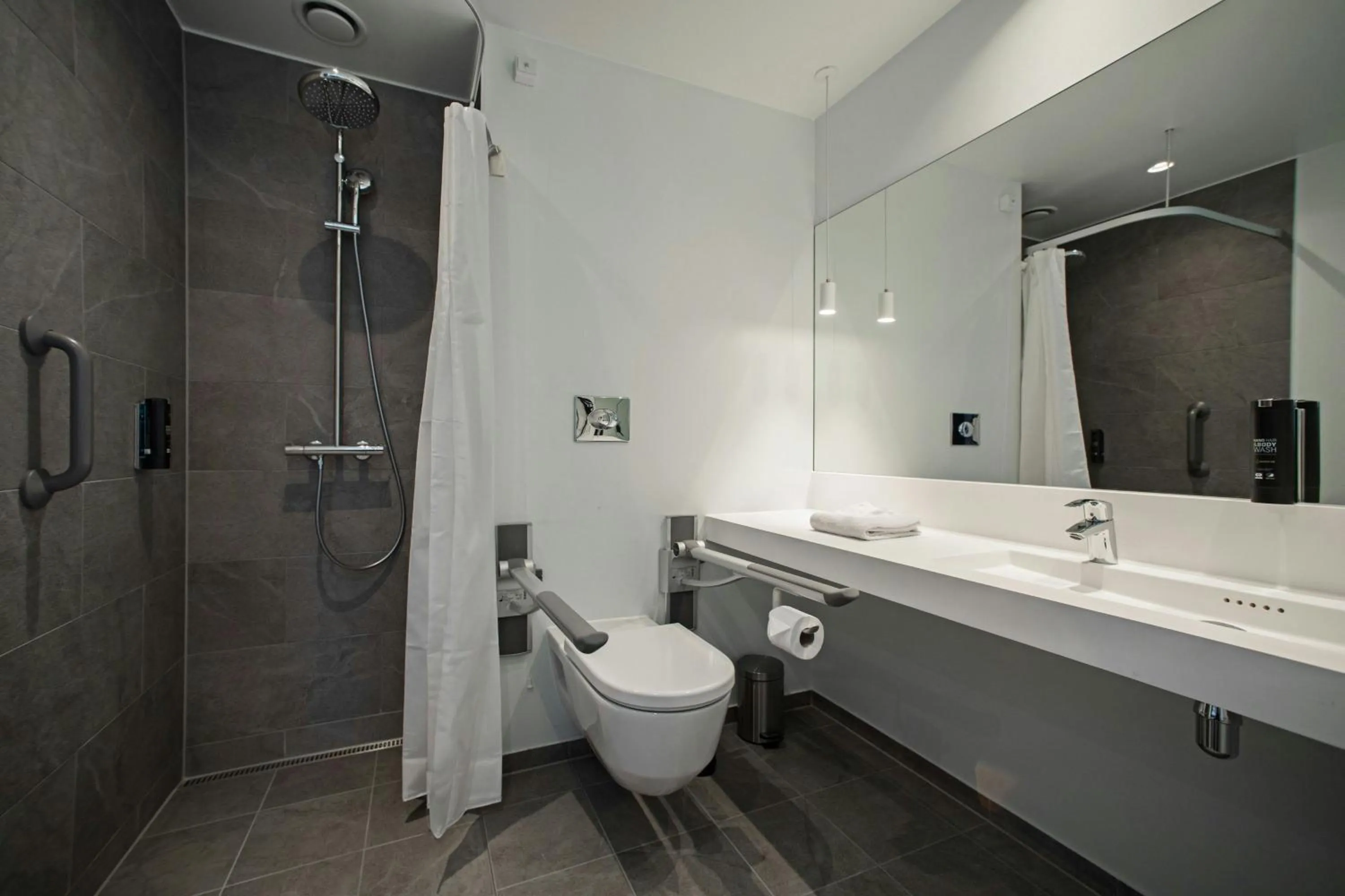 Bathroom in Four Points Flex by Sheraton Horsens