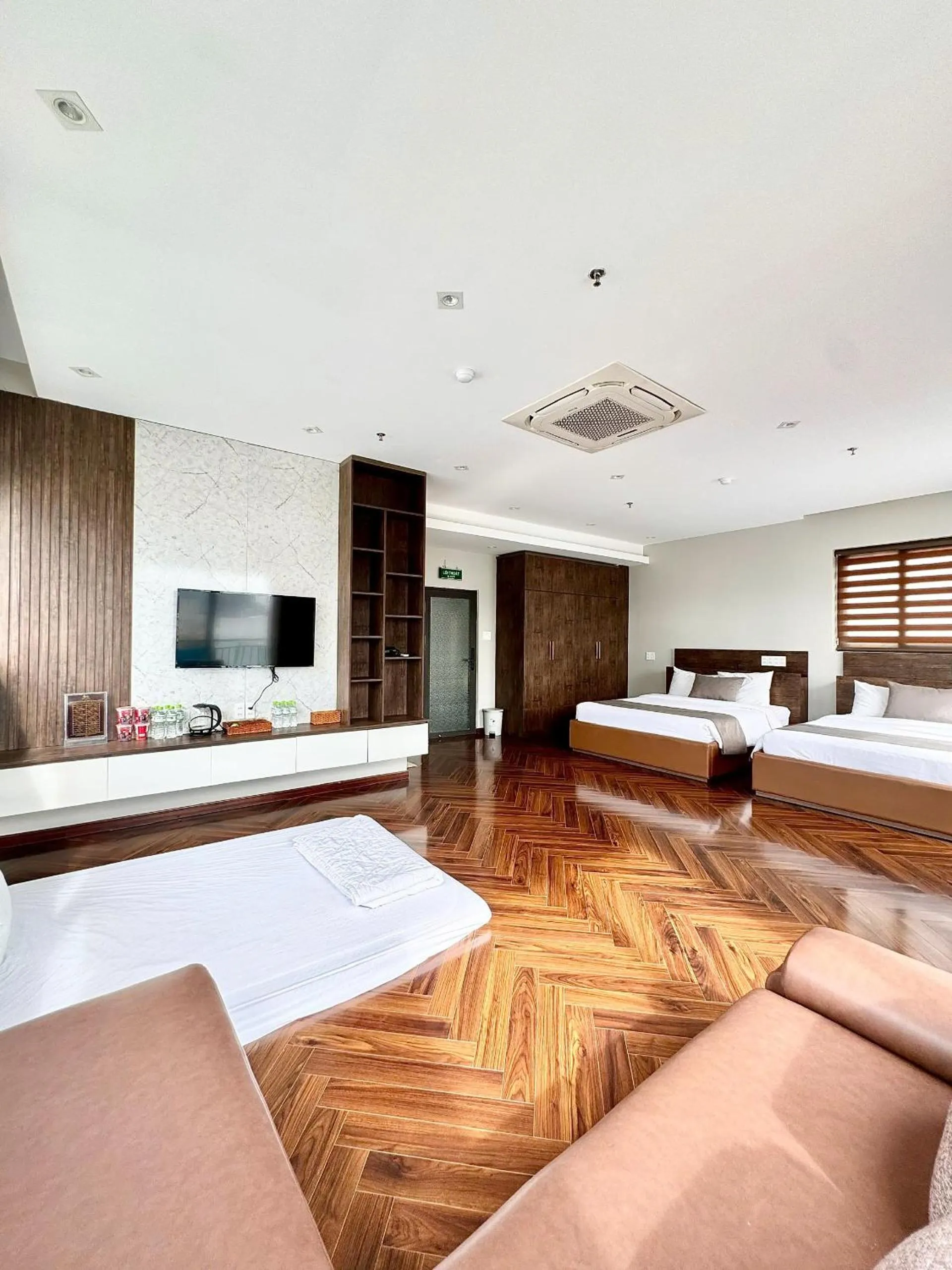 Communal lounge/ TV room, Bed in Hải Long Hotel 2