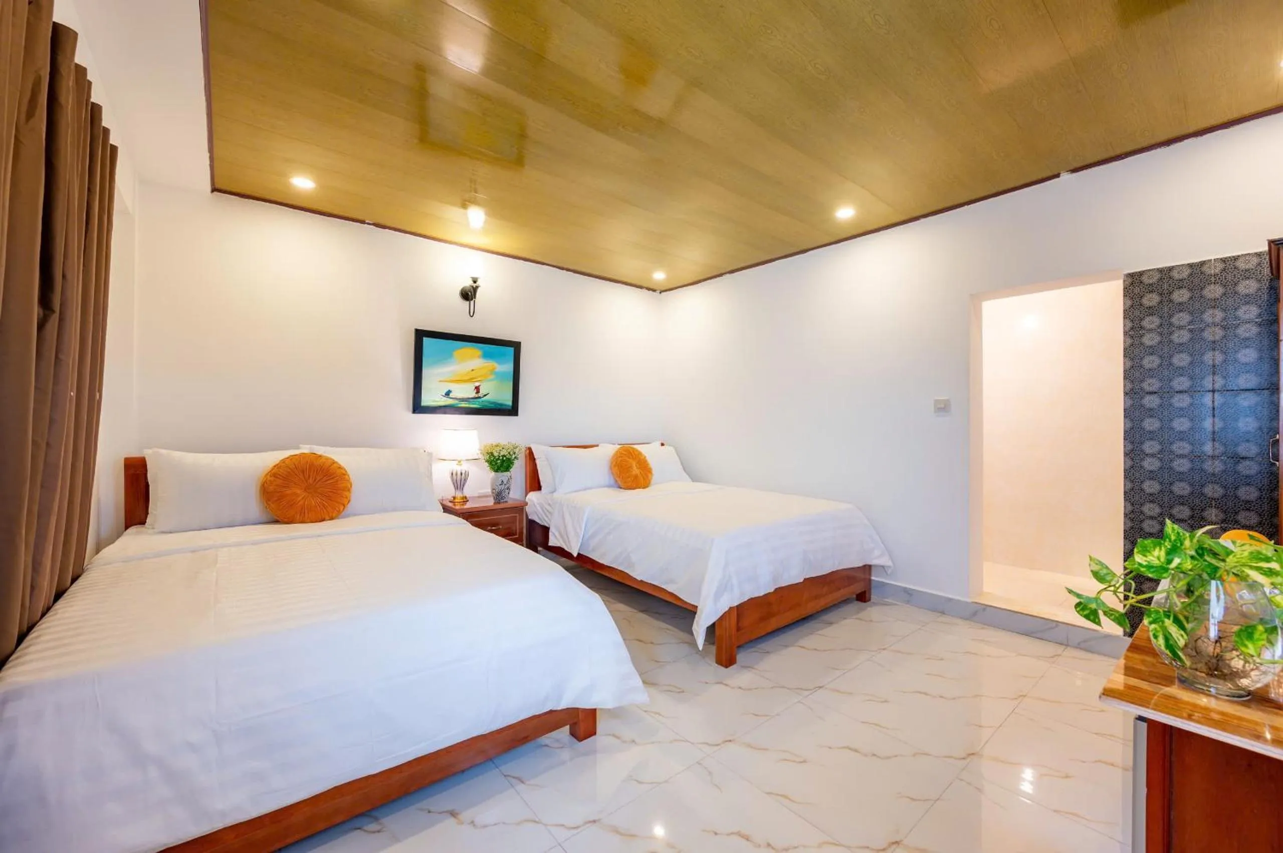 Bed in Golden Sun Hotel Hoi An