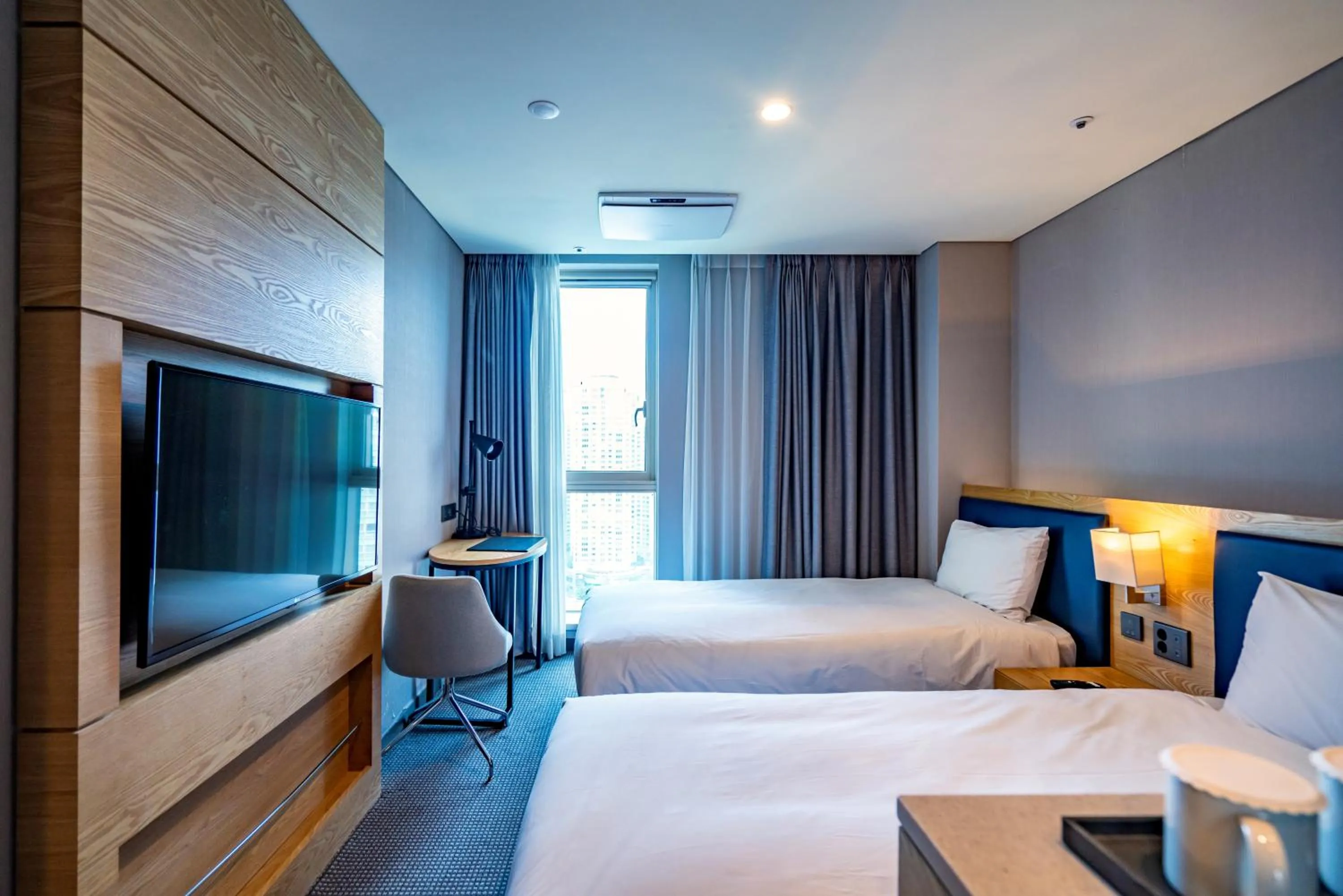 Bed in Centum Business Hotel