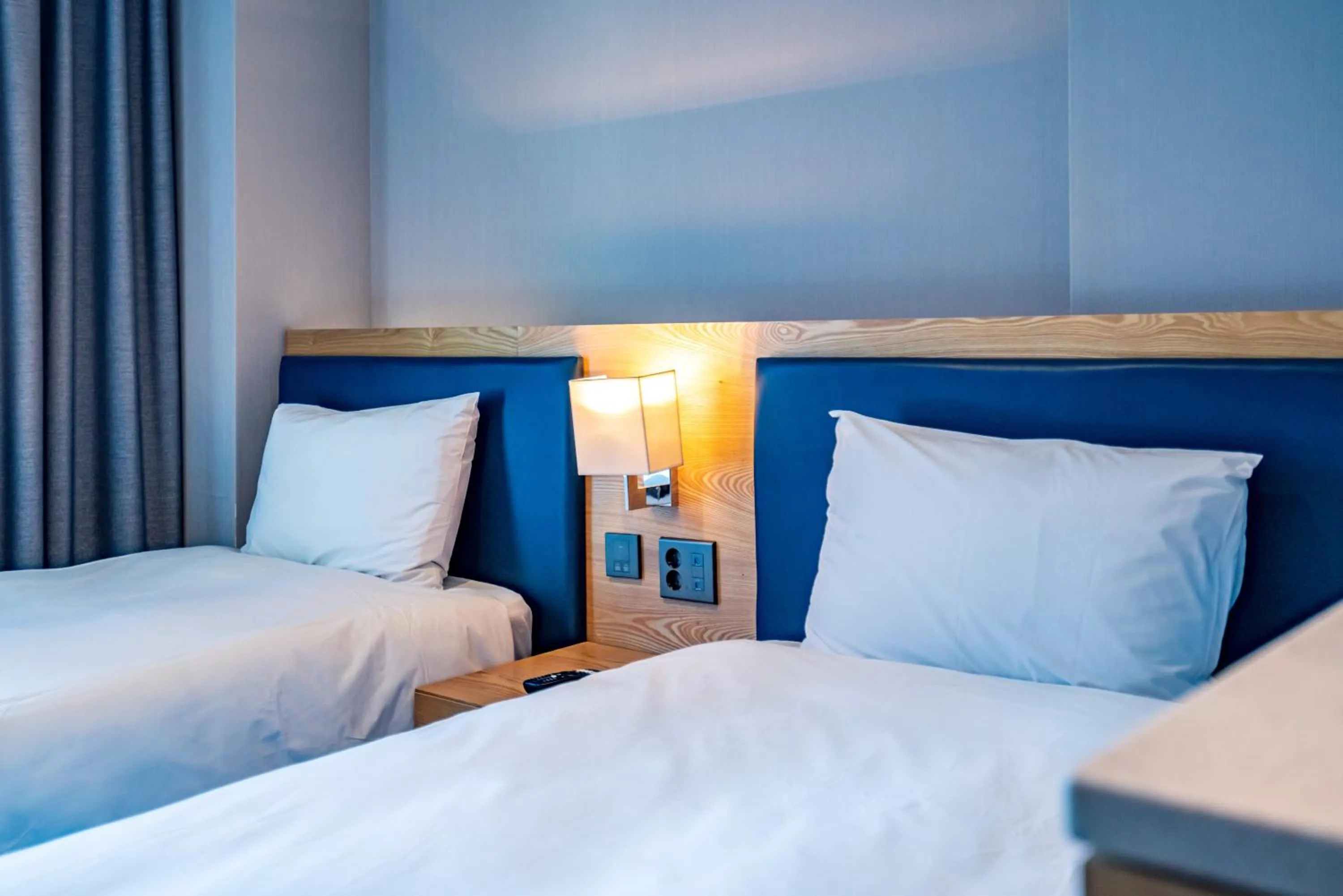 Bed in Centum Business Hotel