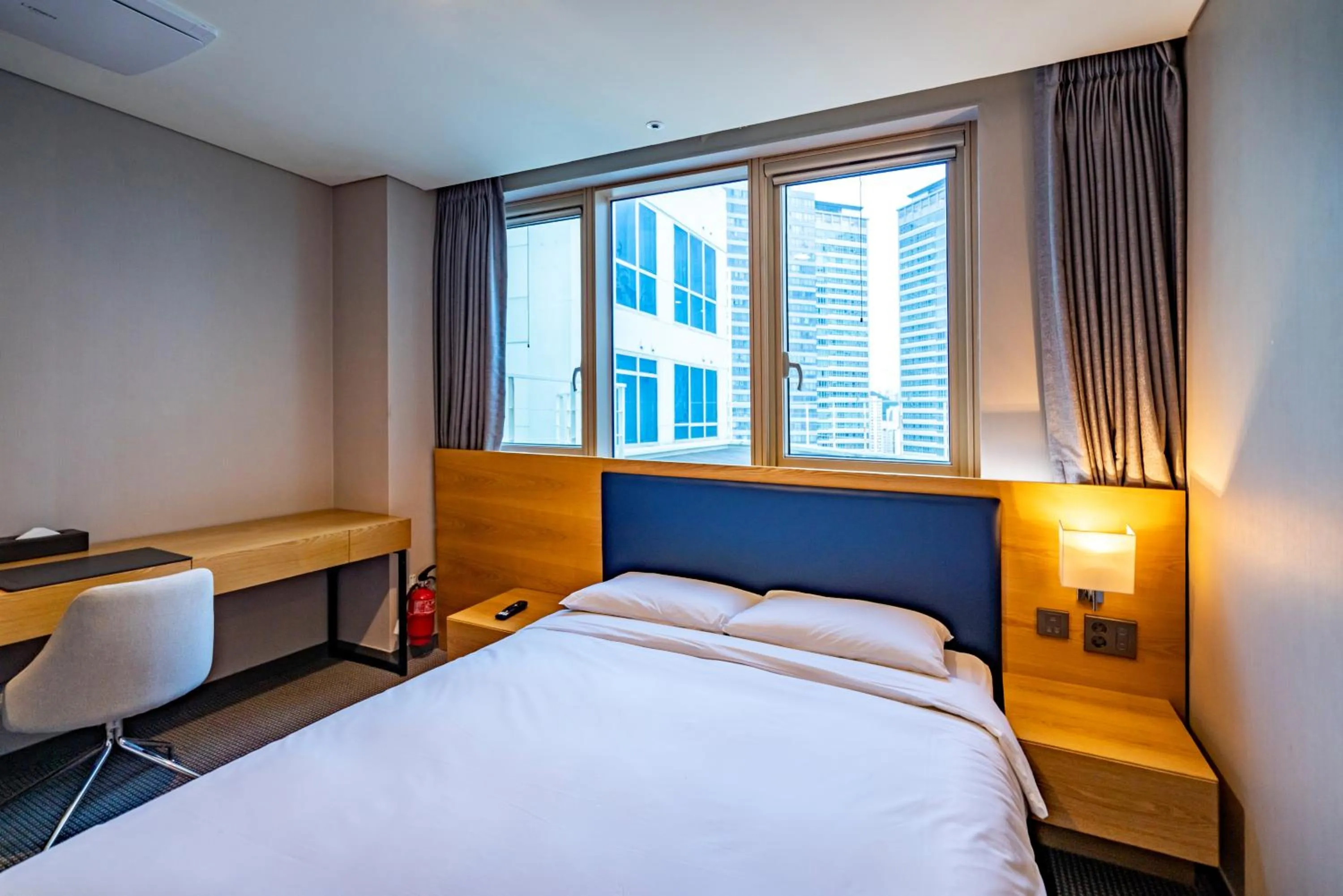 Bedroom, Bed in Centum Business Hotel